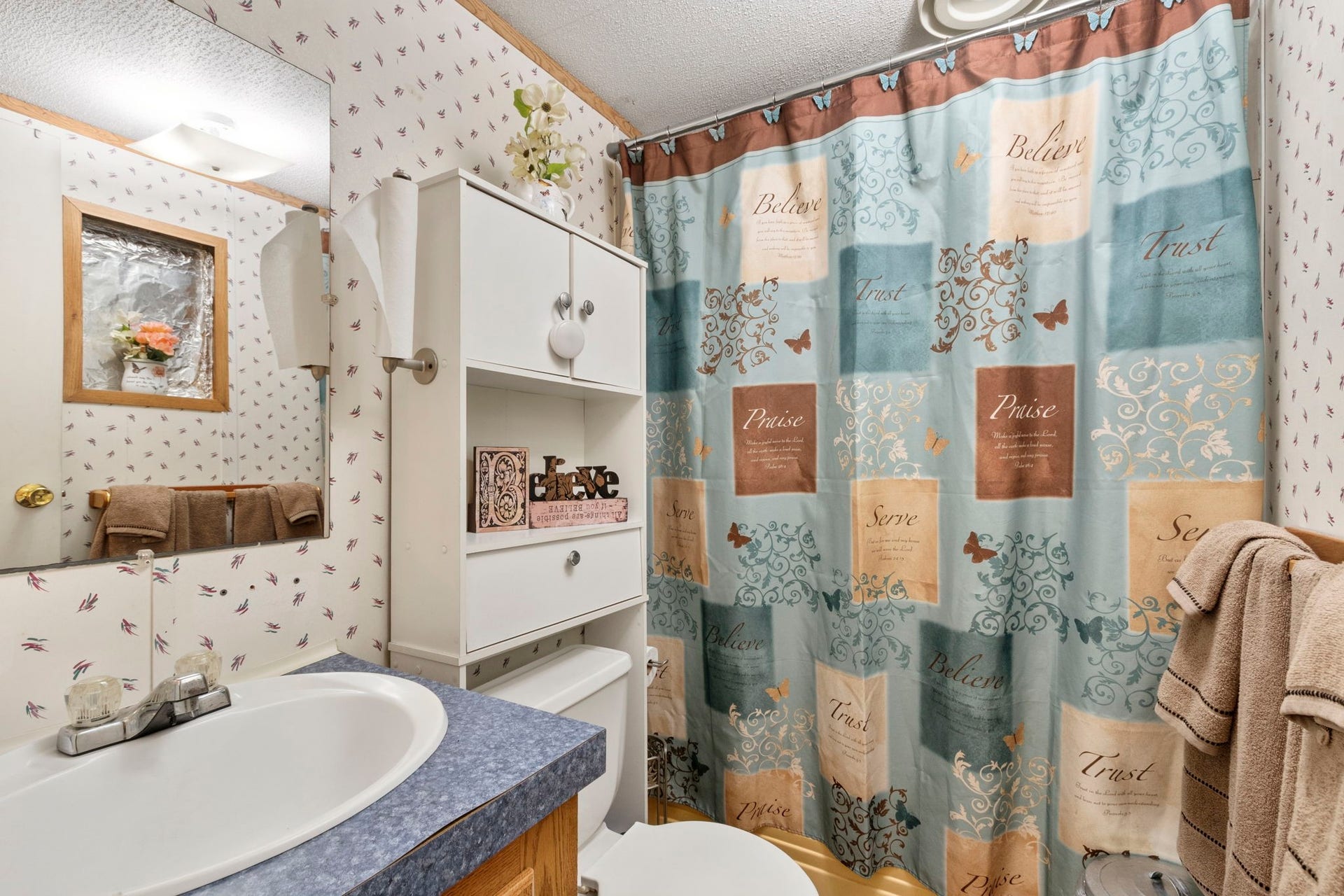 The secondary bathroom features a tub and shower combination, conveniently serving guests, the second bedroom, or a private office space.
