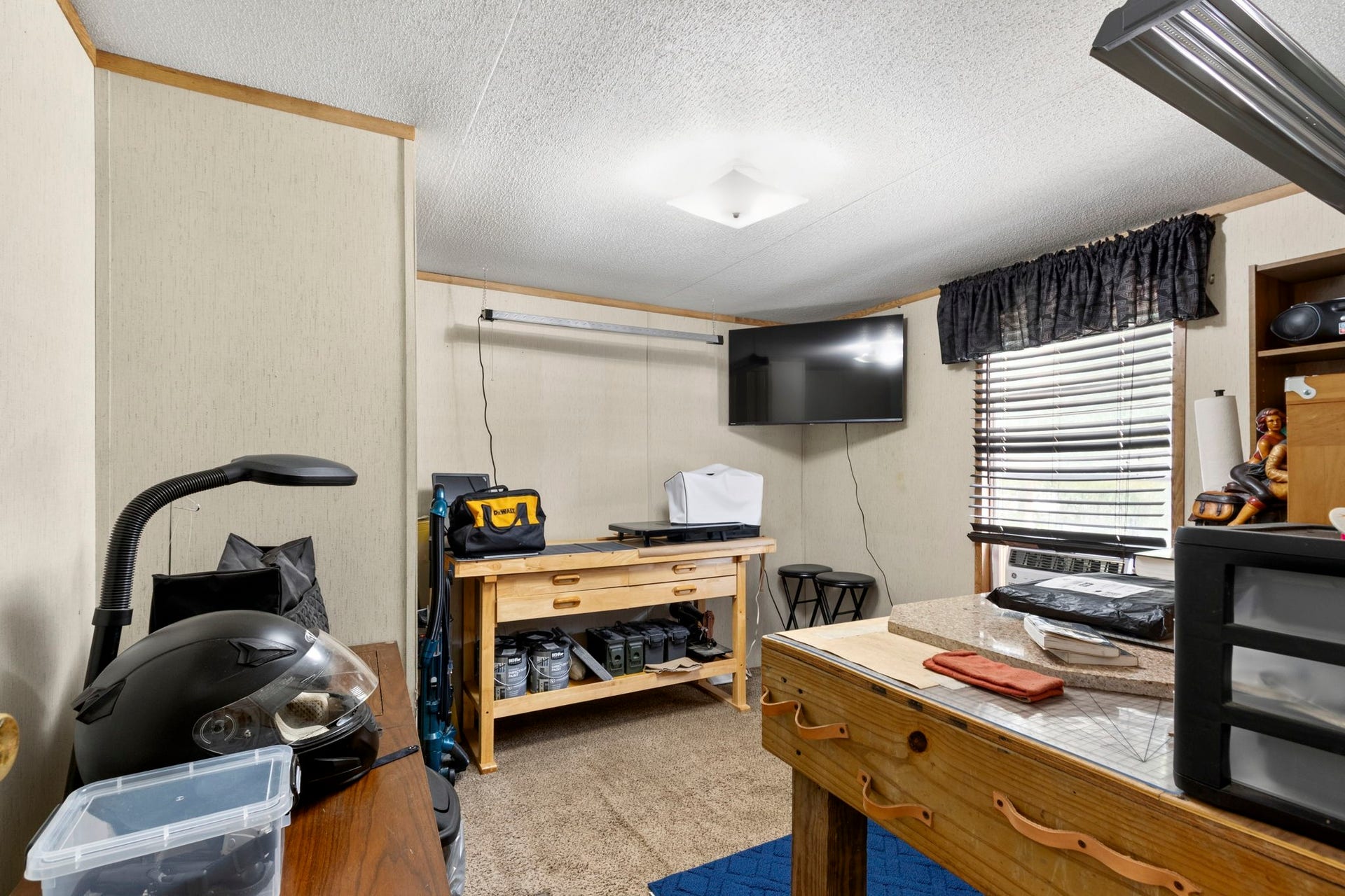 The second bedroom offers comfortable space and a dedicated closet for storage.