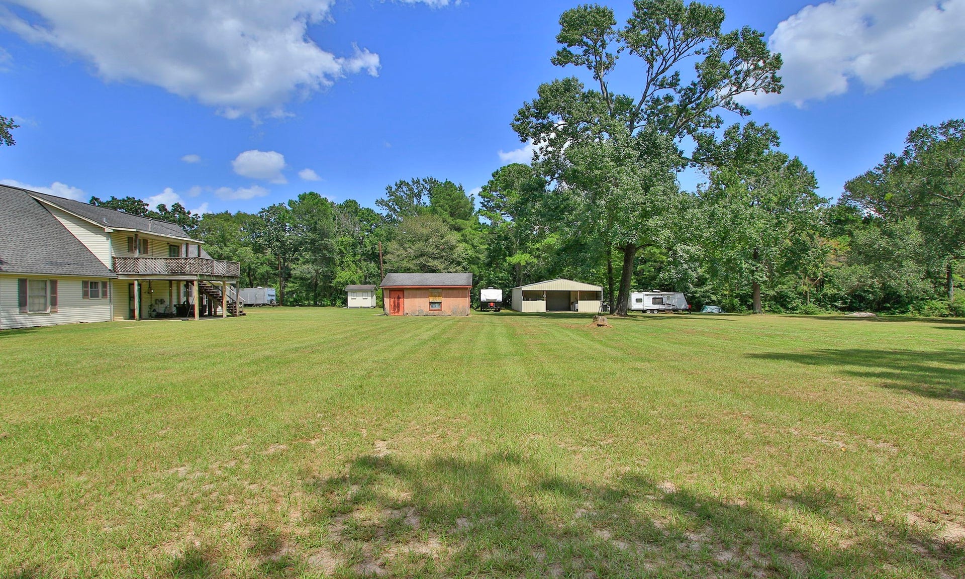 Land, land, and more land! There is plenty of space to bring the whole family, enjoy the outdoors, and create the country lifestyle you have been dreaming of.