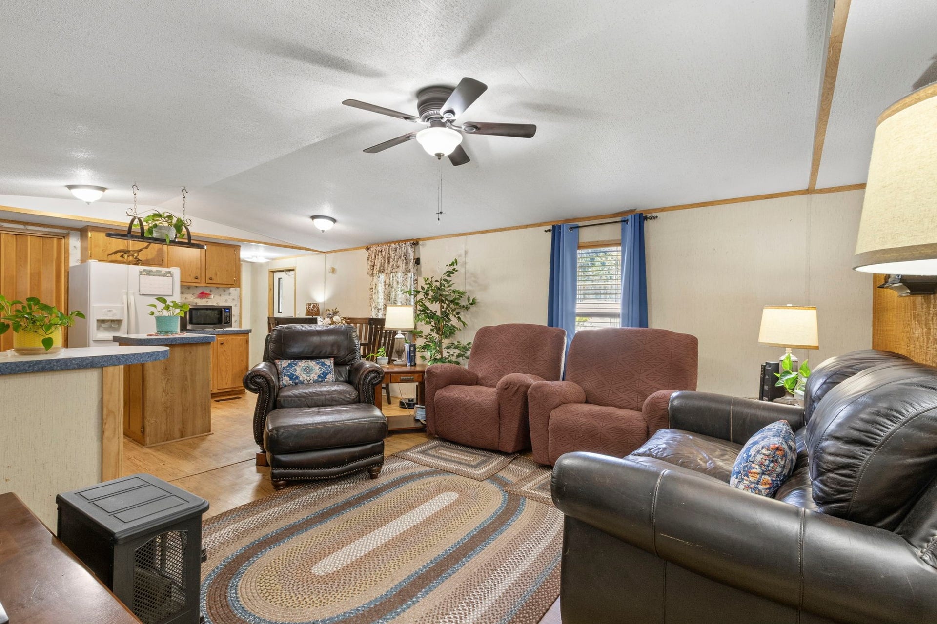 Inside, the second home offers a comfortable living room, kitchen, two bedrooms, and two full bathrooms.
