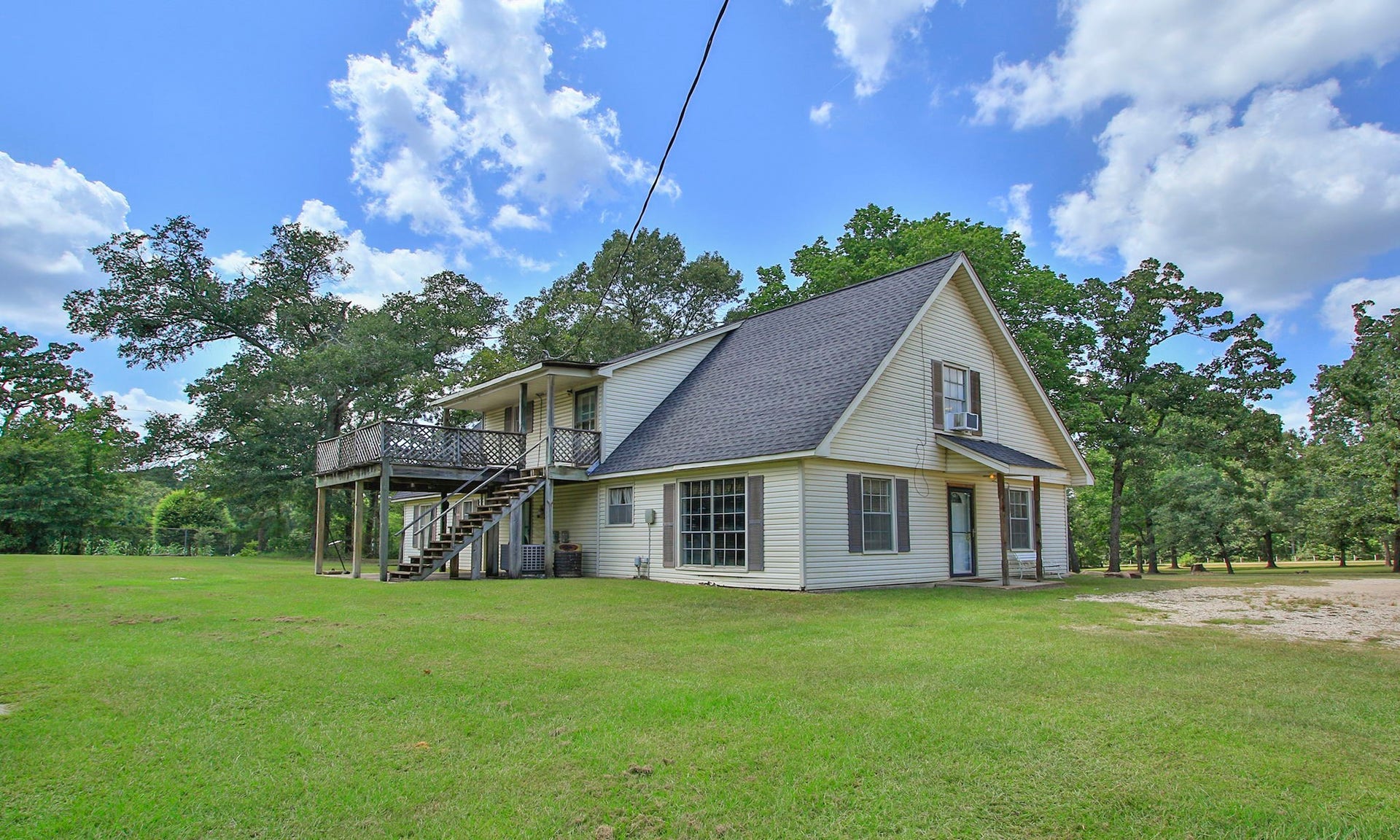 Can you imagine creating the outdoor space you have always wanted, with plenty of room to relax, entertain, garden, or simply enjoy the peaceful acreage.