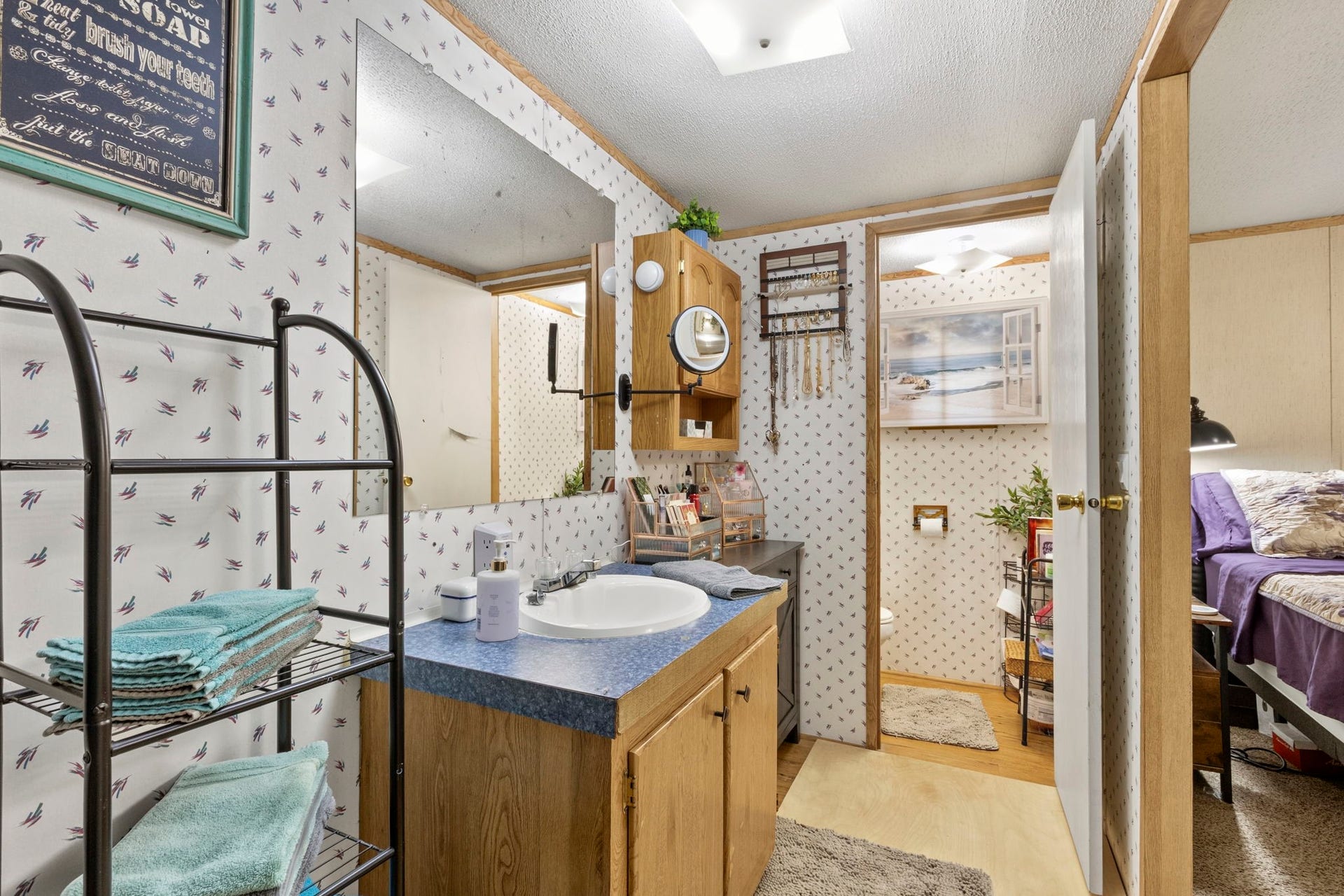 The private primary bathroom features a tub and shower combination with a separate water closet.