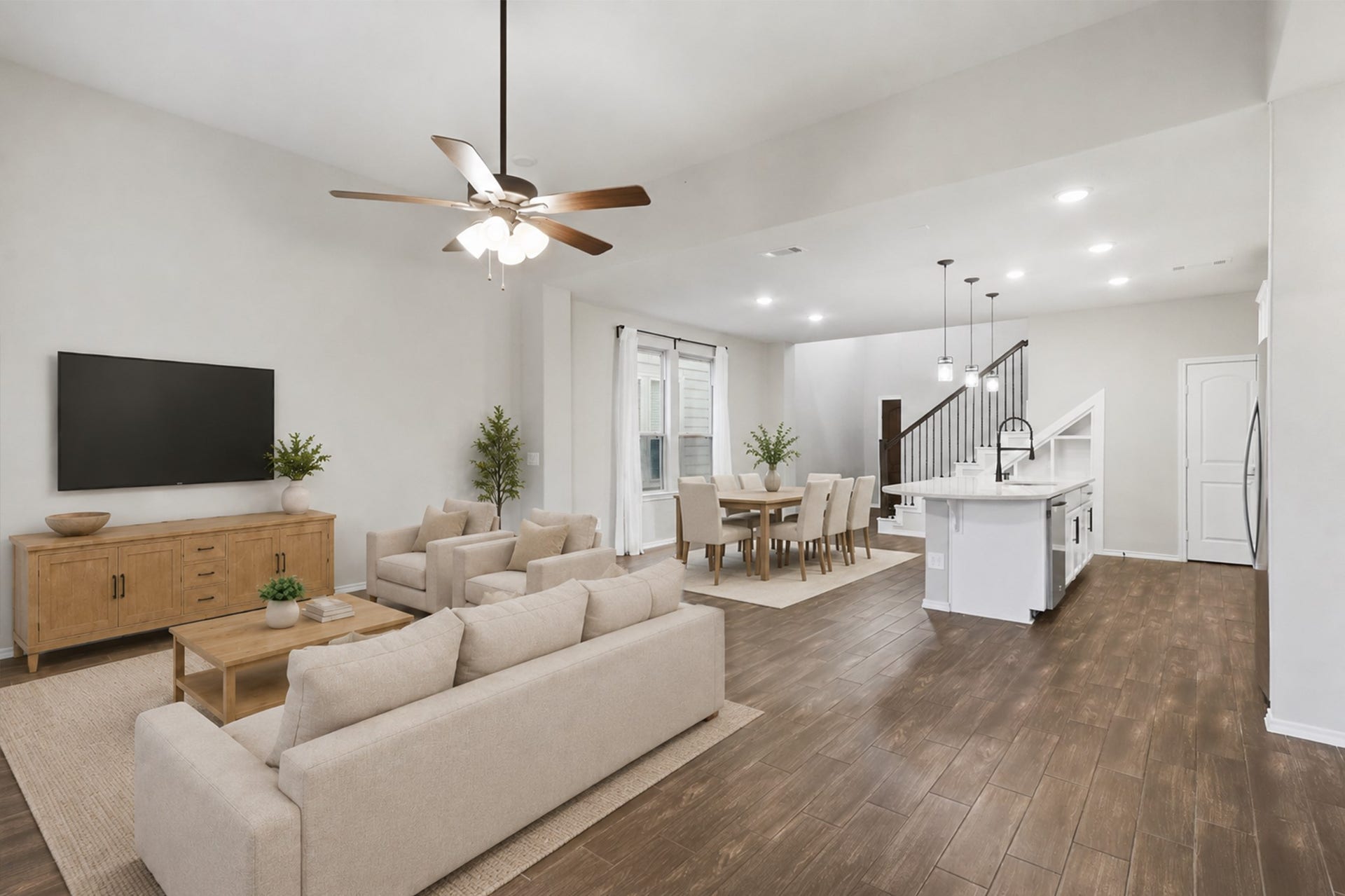 4028 Starbright Street, Houston, TX 77018 Looking back toward the rear of the main floor emphasizes the recessed lighting, neutral paint palette, and clear sightlines across the entire open floor plan.**Virtually staged