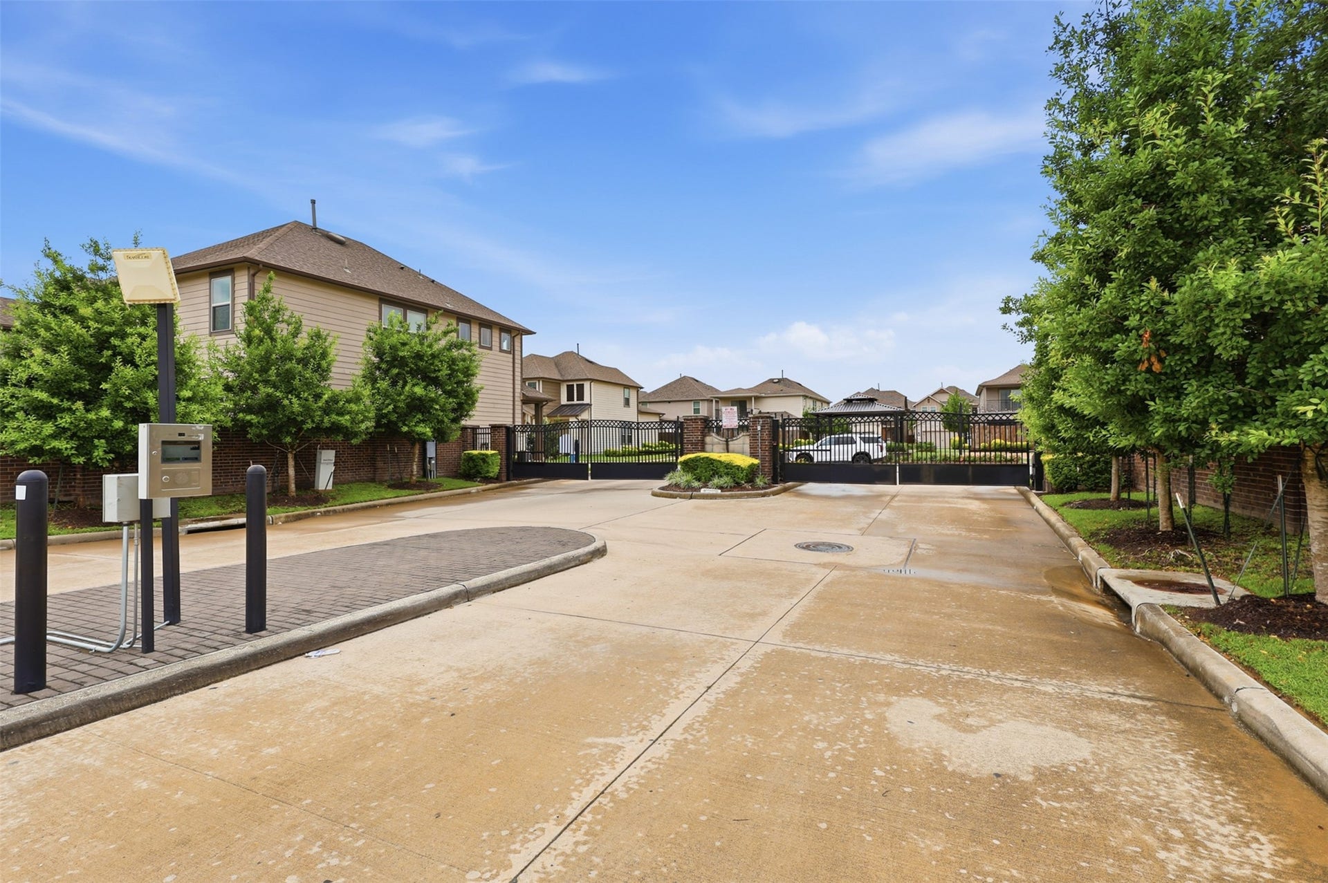 4028 Starbright Street, Houston, TX 77018 The secure, gated neighborhood entry with an automated call box ensures enhanced privacy and controlled access for residents.