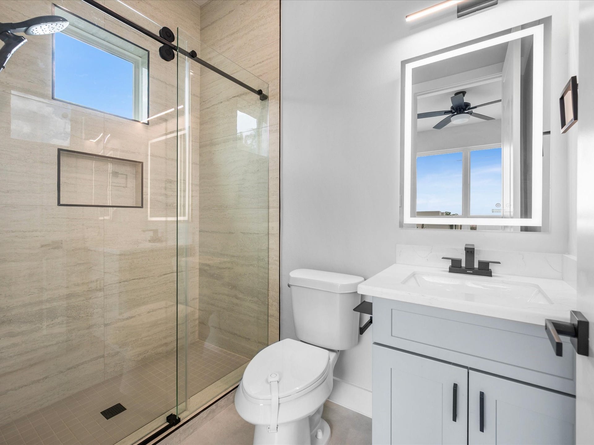 120 Estelle Street, Houston, TX 77003 The third full bath offers a private bathroom for the homes third bedroom, giving each bedroom its own ensuite.