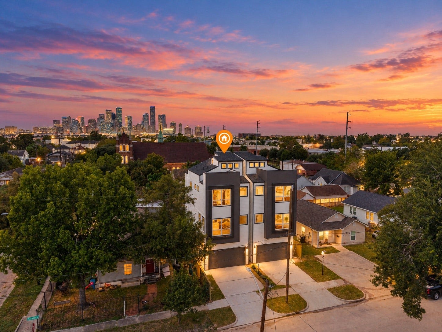 120 Estelle Street, Houston, TX 77003 Modern architecture and sophisticated design set the tone for this stunning new construction home in EaDo, where contemporary urban living meets impressive downtown Houston views. Virtually enhanced with AI to showcase twilight setting.