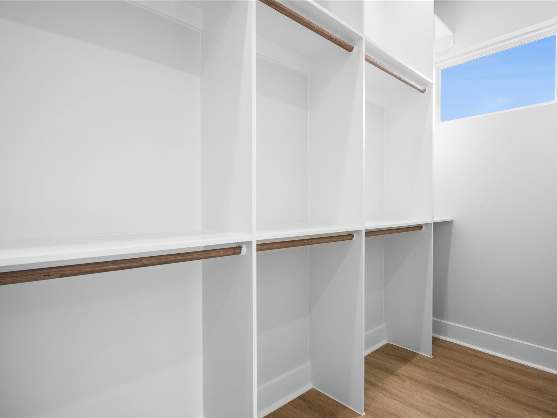 120 Estelle Street, Houston, TX 77003 The spacious primary closet features built-in storage to keep wardrobes and accessories organized.