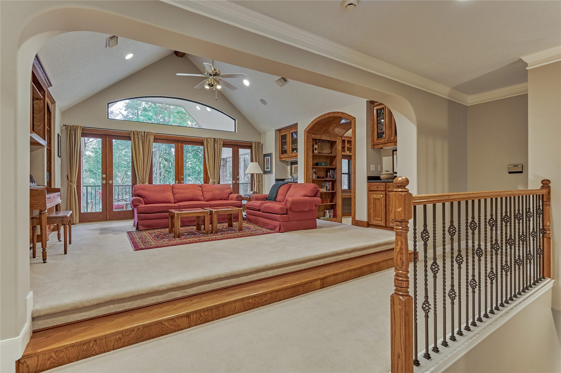 3073 Bentwater Drive, Montgomery, TX 77356 The game room overlooks the grand foyer and features custom built-in storage.