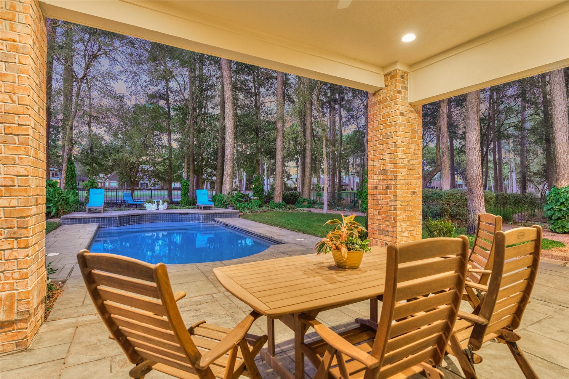 3073 Bentwater Drive, Montgomery, TX 77356 Take in the incredible views of the majestic trees and skyline from the patio.
