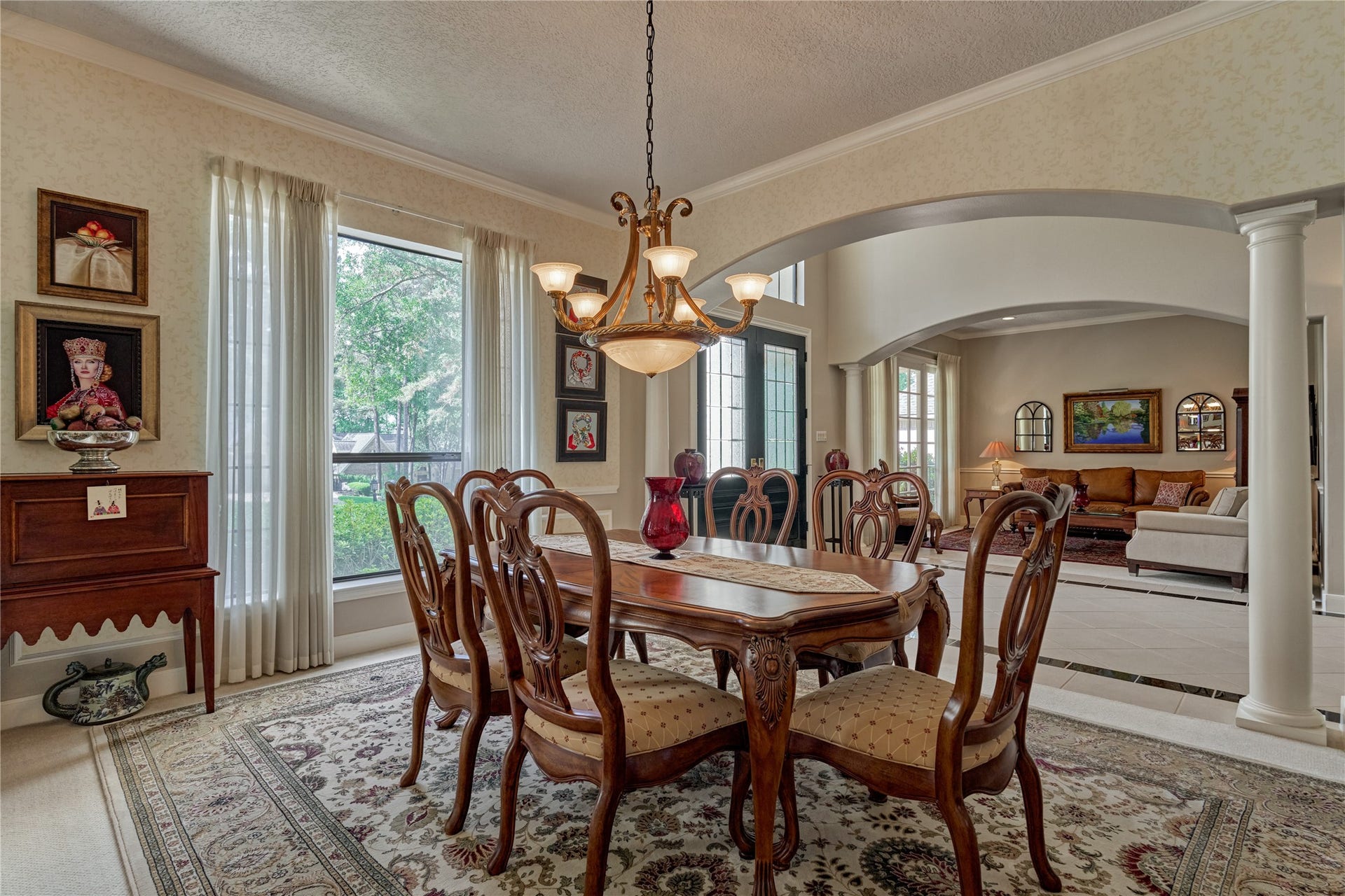 3073 Bentwater Drive, Montgomery, TX 77356 Formal dining room with elegant lighting and huge picture window.
