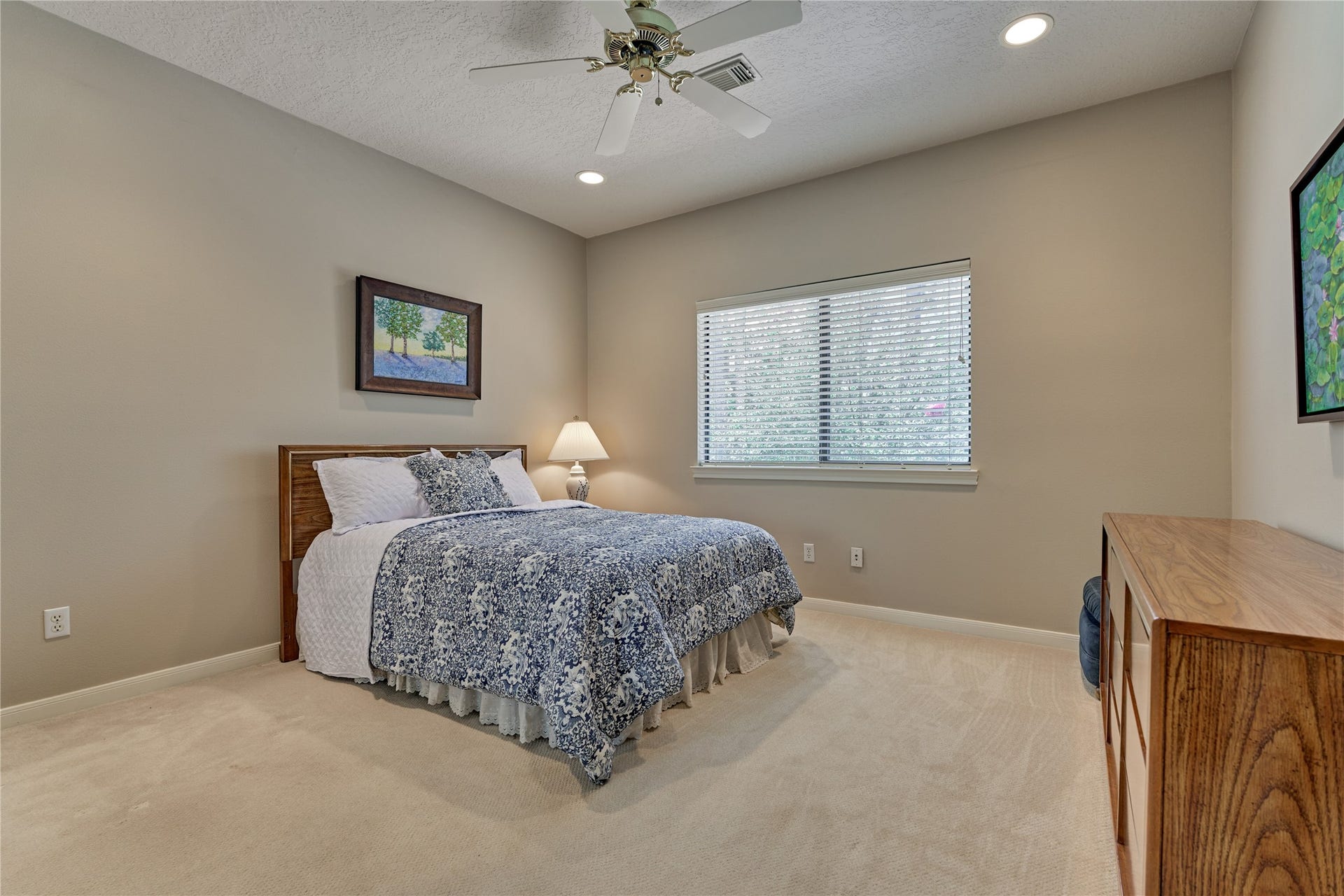 3073 Bentwater Drive, Montgomery, TX 77356 Bedroom #2 overlooks the backyard and shares a bath with bedroom #3.