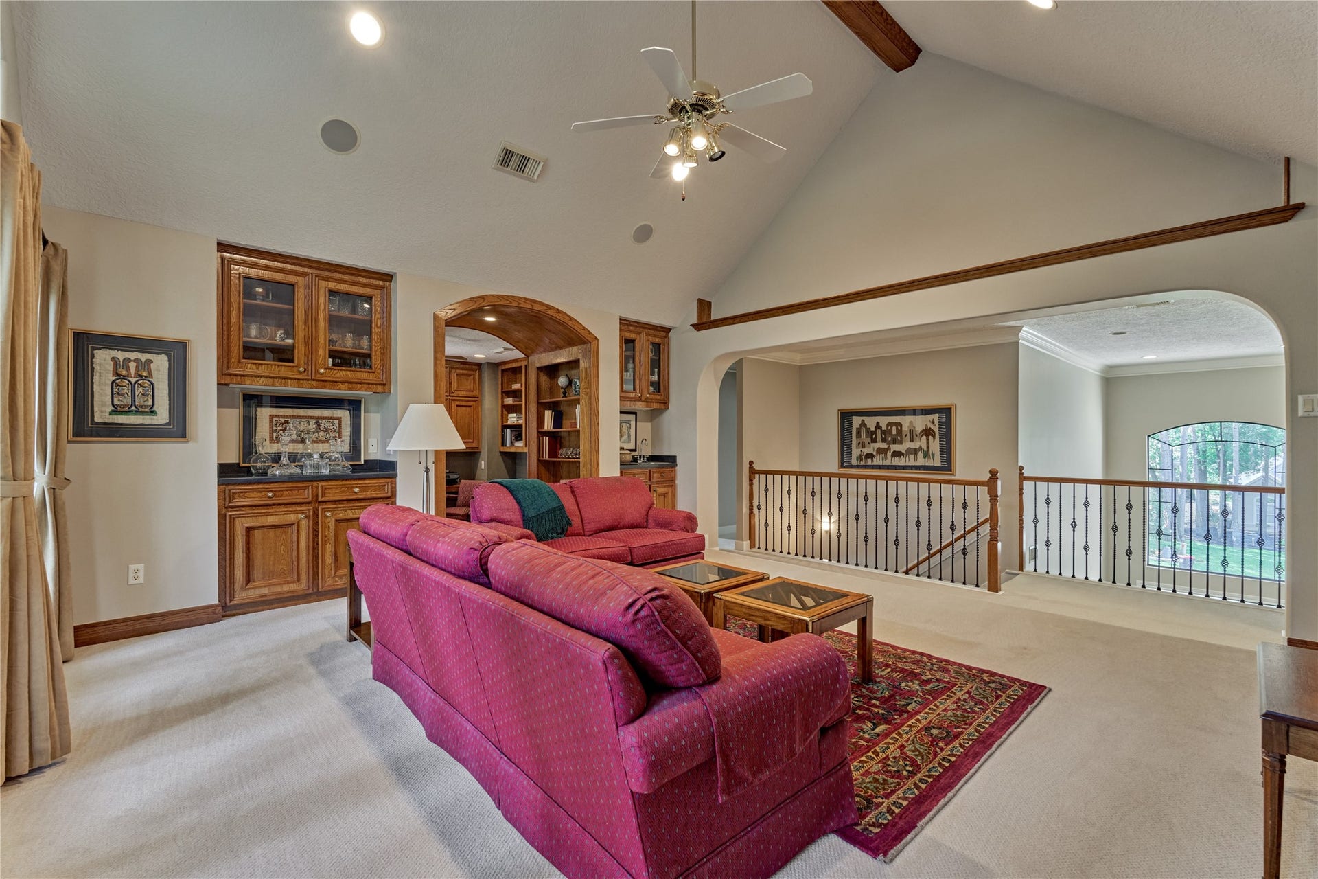 3073 Bentwater Drive, Montgomery, TX 77356 From this view you can see the entrance into the study through the built-in hall bookcases.