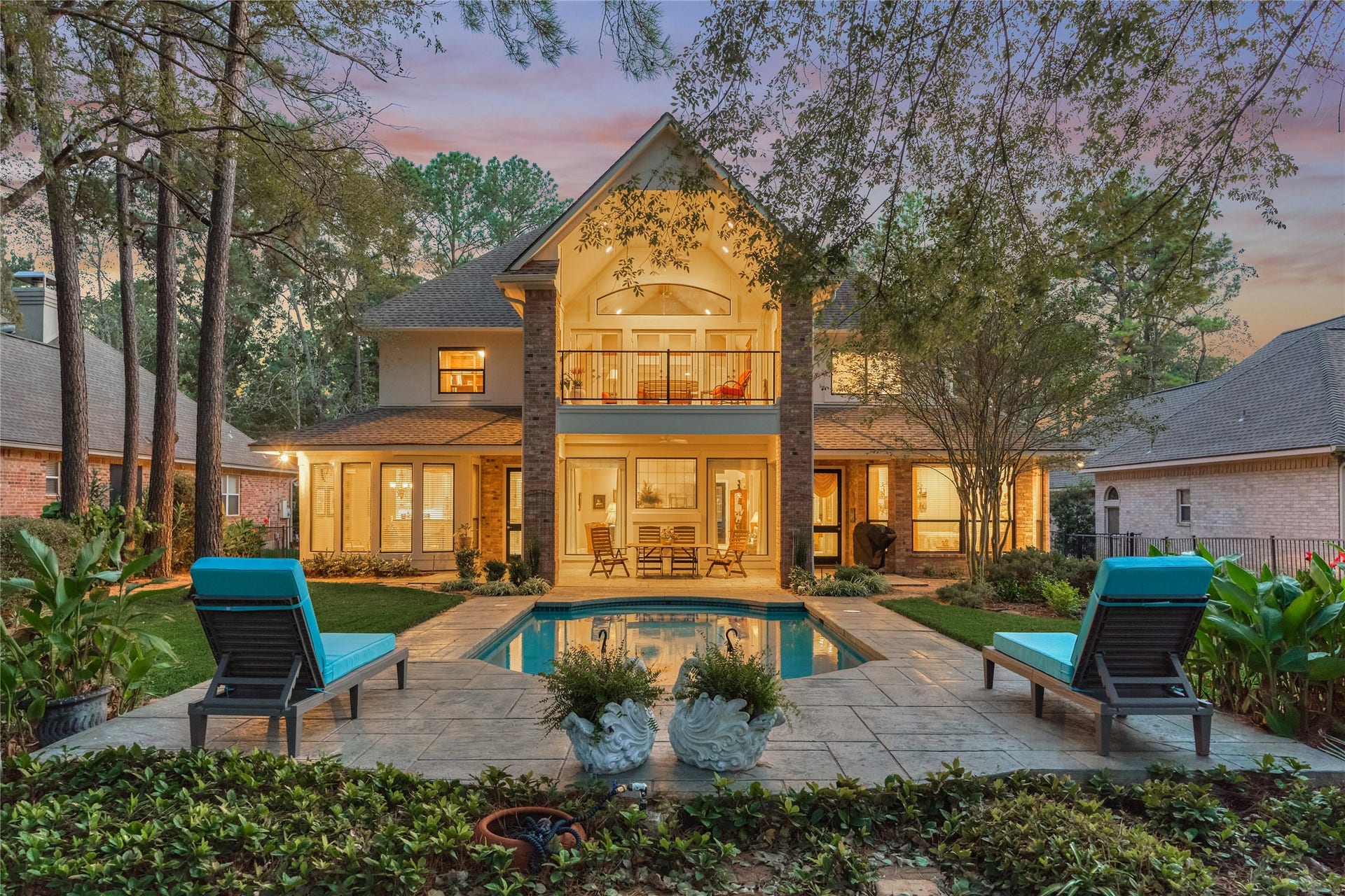 3073 Bentwater Drive, Montgomery, TX 77356 Beautiful landscaping surrounds the poolside oasis while majestic trees provide a private and shady backyard.