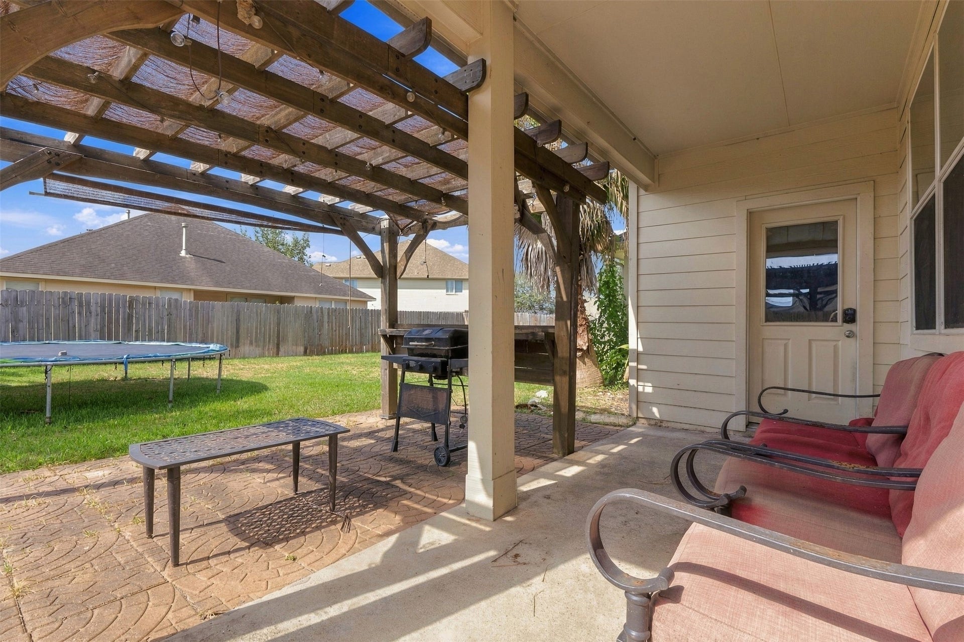 4112 S Meridian Greens Drive, Dickinson, TX 77539 Backyard patio with pergola