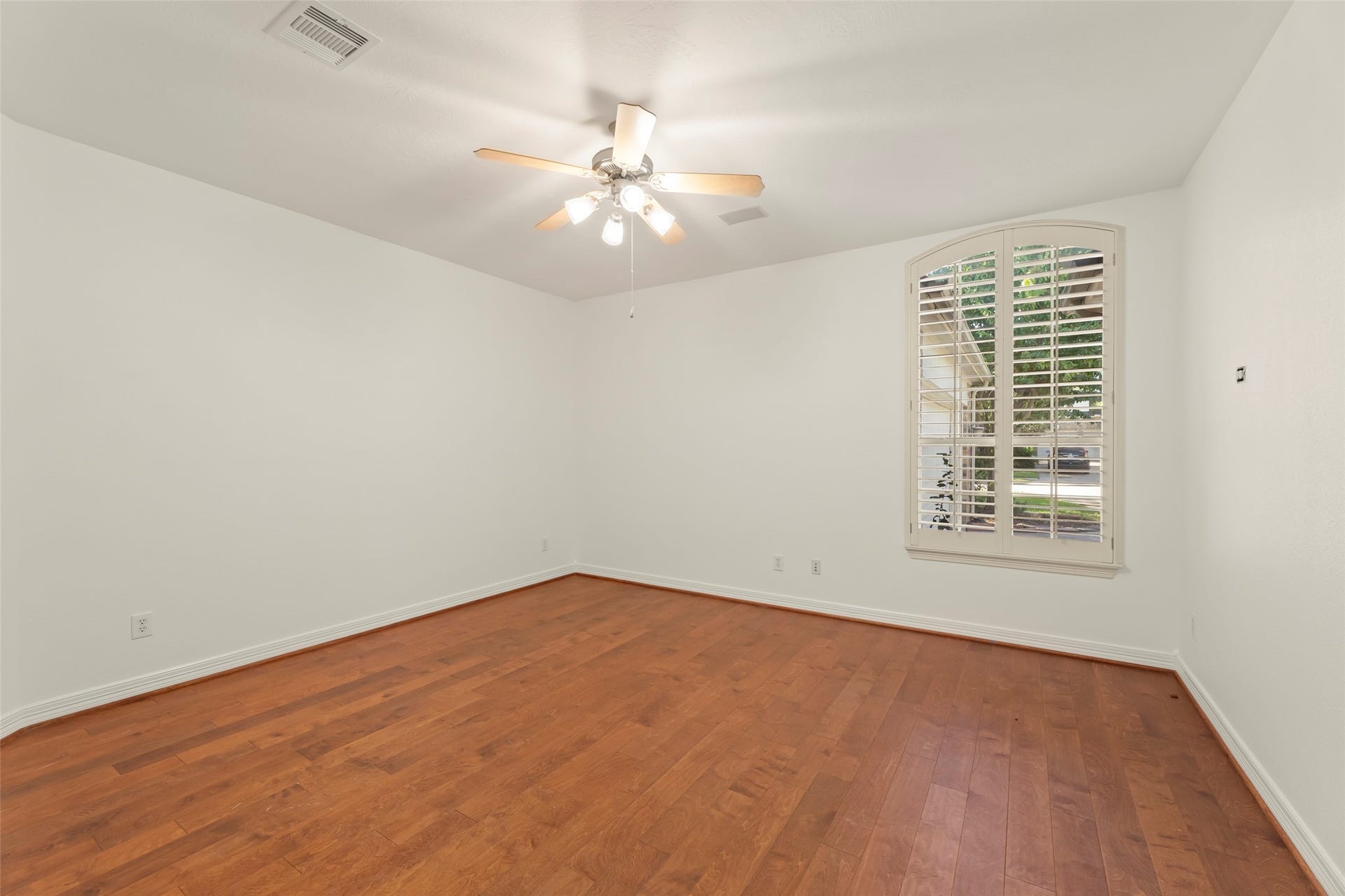 1211 Sterling Court, Katy, TX 77494 Media room/ 2nd bedroom with built in speakers, closet for storage and plantation shutters