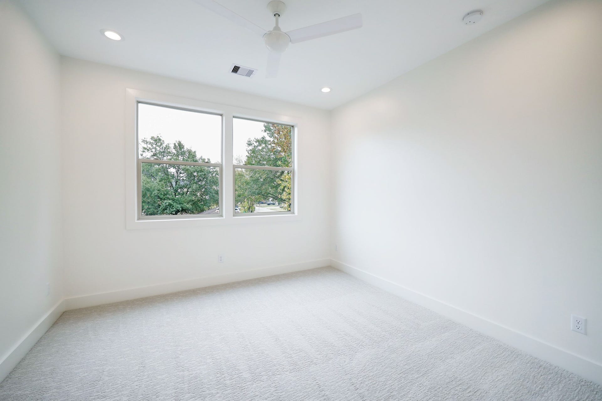 Secondary Bedroom #1 features a ceiling fan with recessed lighting, large closet space and shared bathroom. *Previous Project*