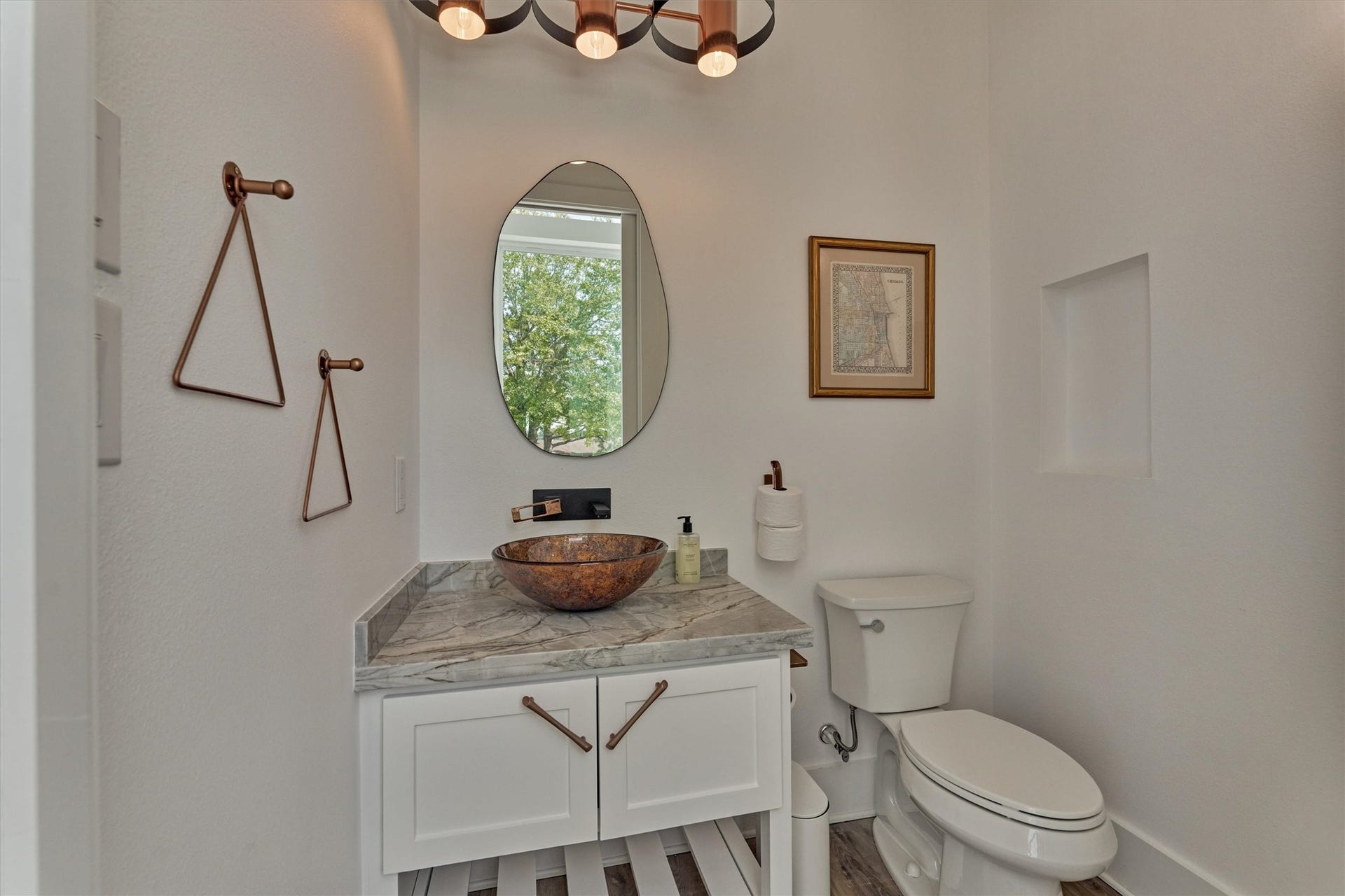9228 Lake Conroe Drive, Conroe, TX 77304 37. The pool bath perfectly complements the modern coastal theme, offering stylish finishes and easy access from the game room and pool.
