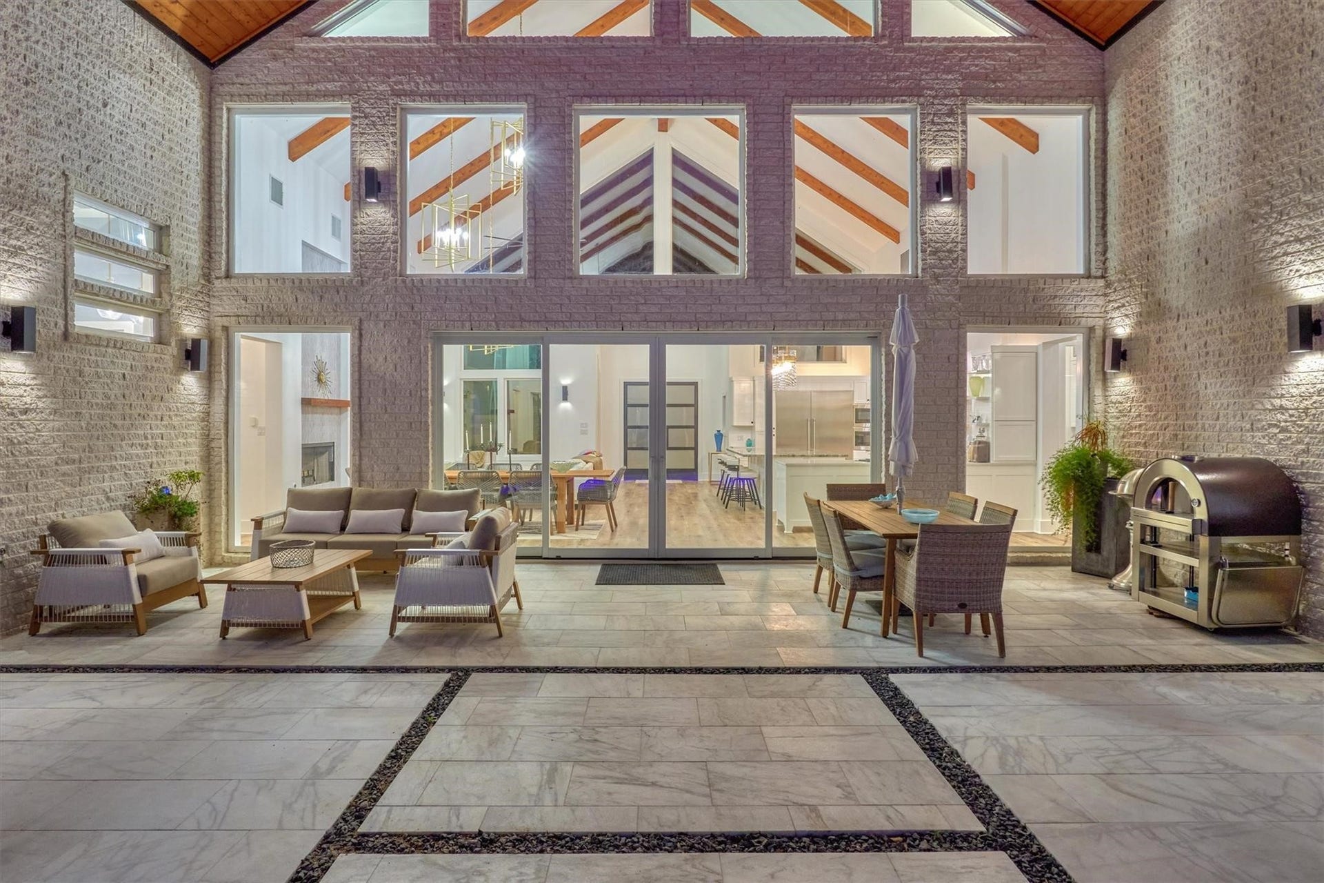 9228 Lake Conroe Drive, Conroe, TX 77304 The architectural details in this home create a feeling of seamless living where the outdoors flow to the indoors creating an open and inviting space.