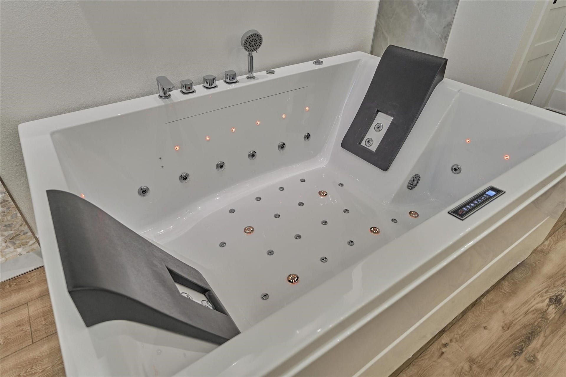 9228 Lake Conroe Drive, Conroe, TX 77304 With built-in features like music, mood lighting, and ample space for two, this spa offers a luxurious experience, making it the perfect spot to relax and unwind.