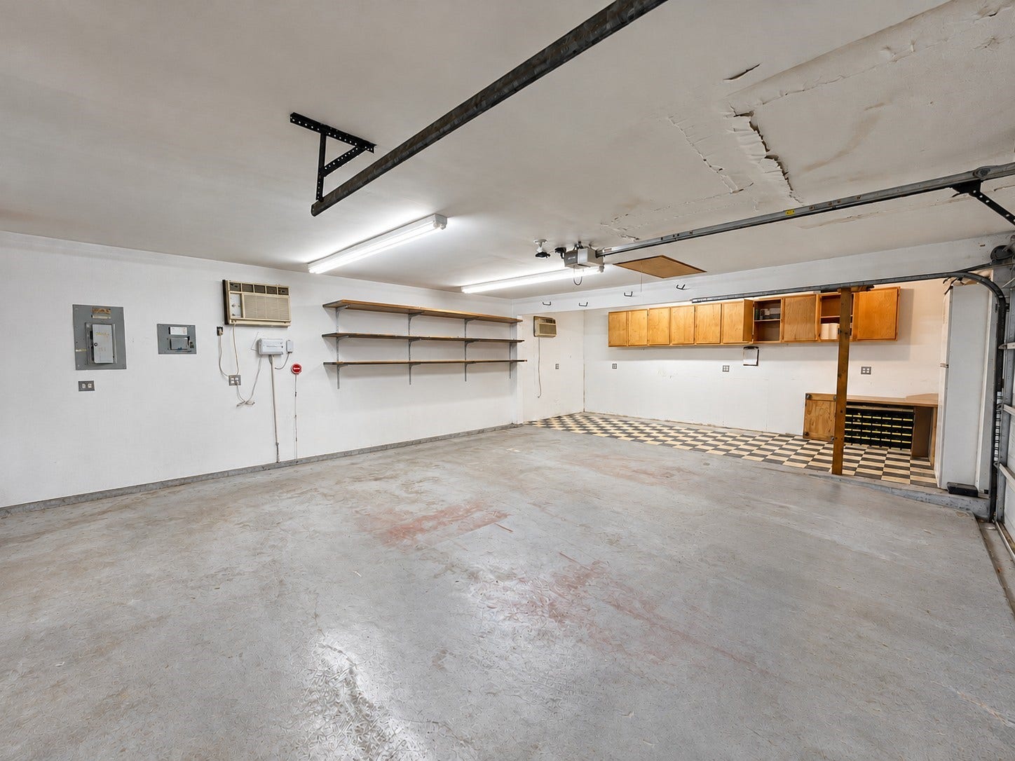 Oversized 2.5 car garage with workshop