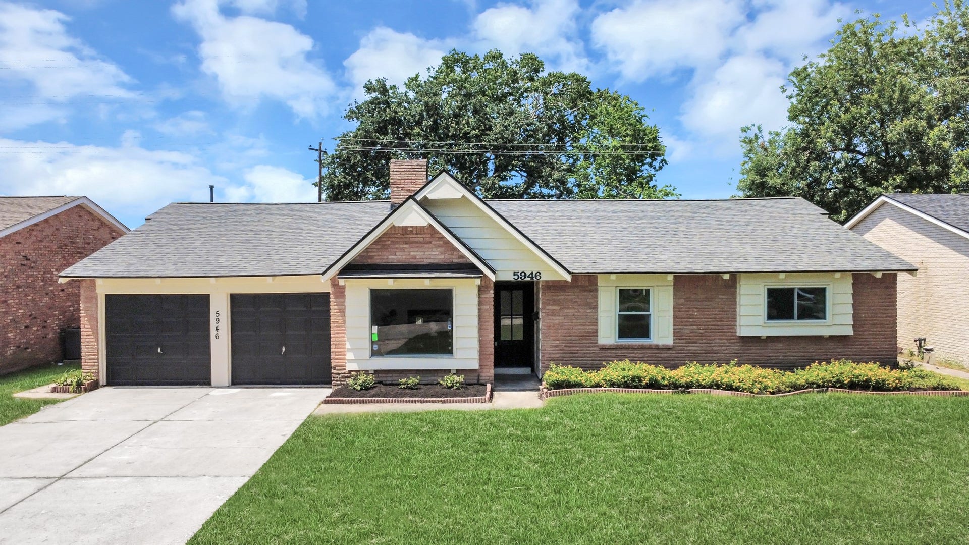 5946 Willowbend Boulevard, Houston, TX 77096 Stunning front elevation featuring modern updates, mature trees, and inviting curb appeal.