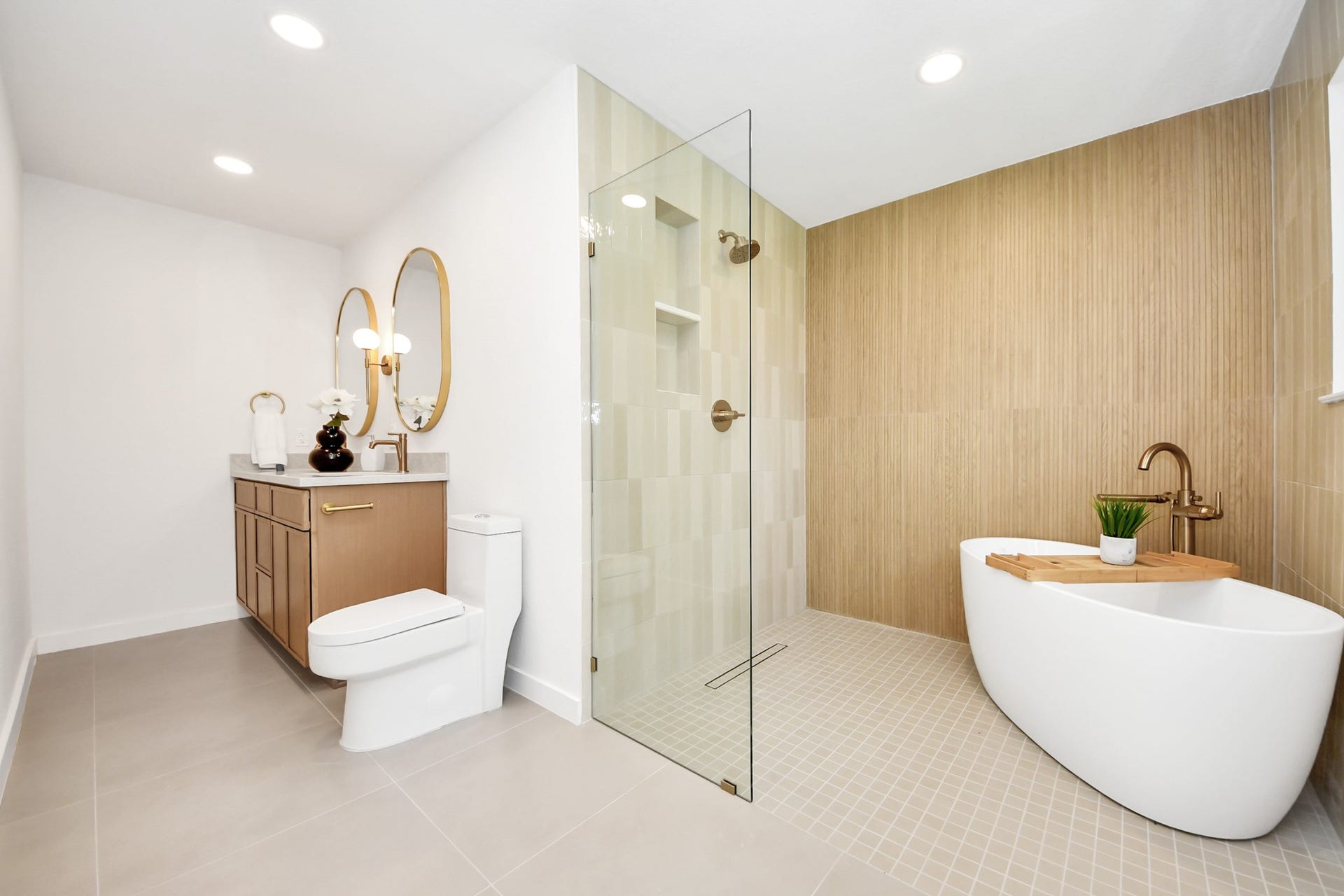 5946 Willowbend Boulevard, Houston, TX 77096 Luxurious spa-inspired primary bathroom featuring a freestanding soaking tub, oversized walk-in shower, and designer finishes.