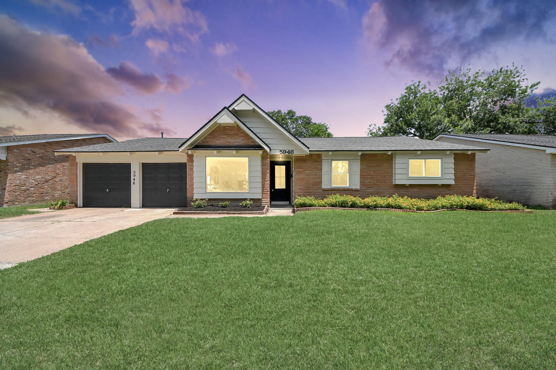 5946 Willowbend Boulevard, Houston, TX 77096 Spacious front yard with plenty of green space, ideal for entertaining, pets, or future outdoor additions.