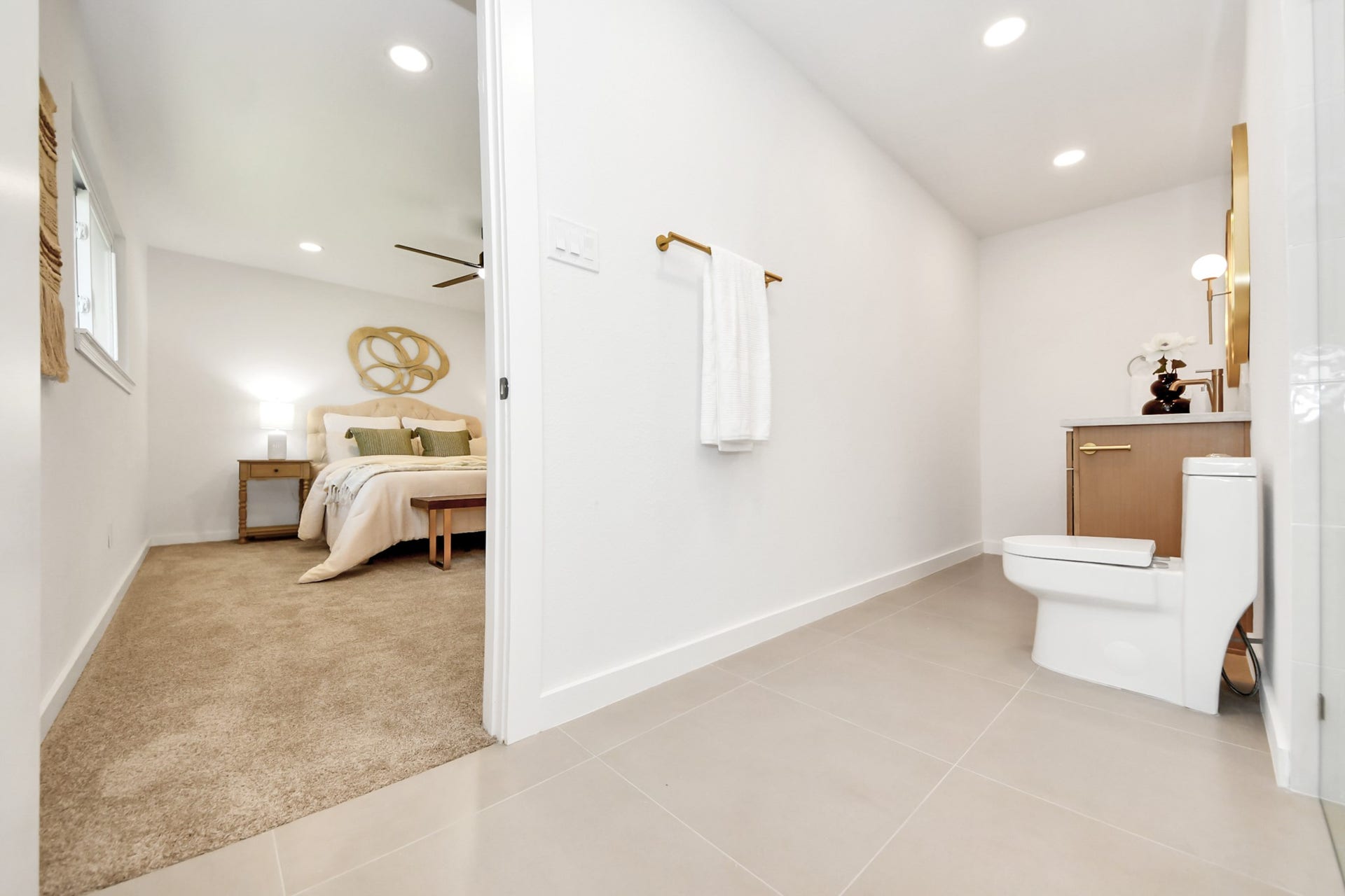 5946 Willowbend Boulevard, Houston, TX 77096 Expansive primary suite with direct access to the spa-inspired ensuite bathroom and generous layout.