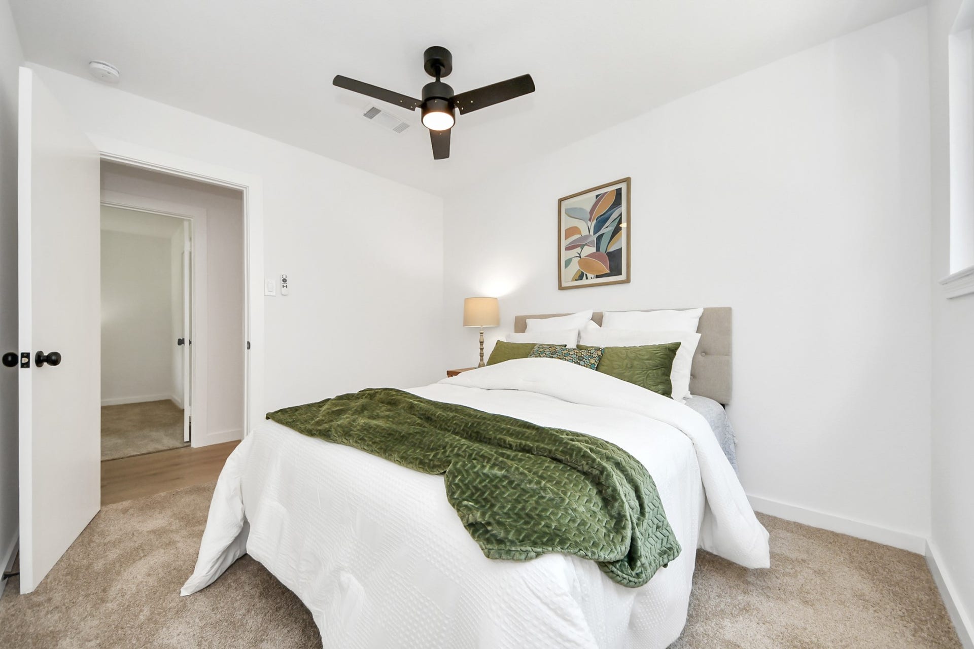 5946 Willowbend Boulevard, Houston, TX 77096 Well-sized secondary bedroom with functional layout, updated finishes, and relaxing neutral tones.