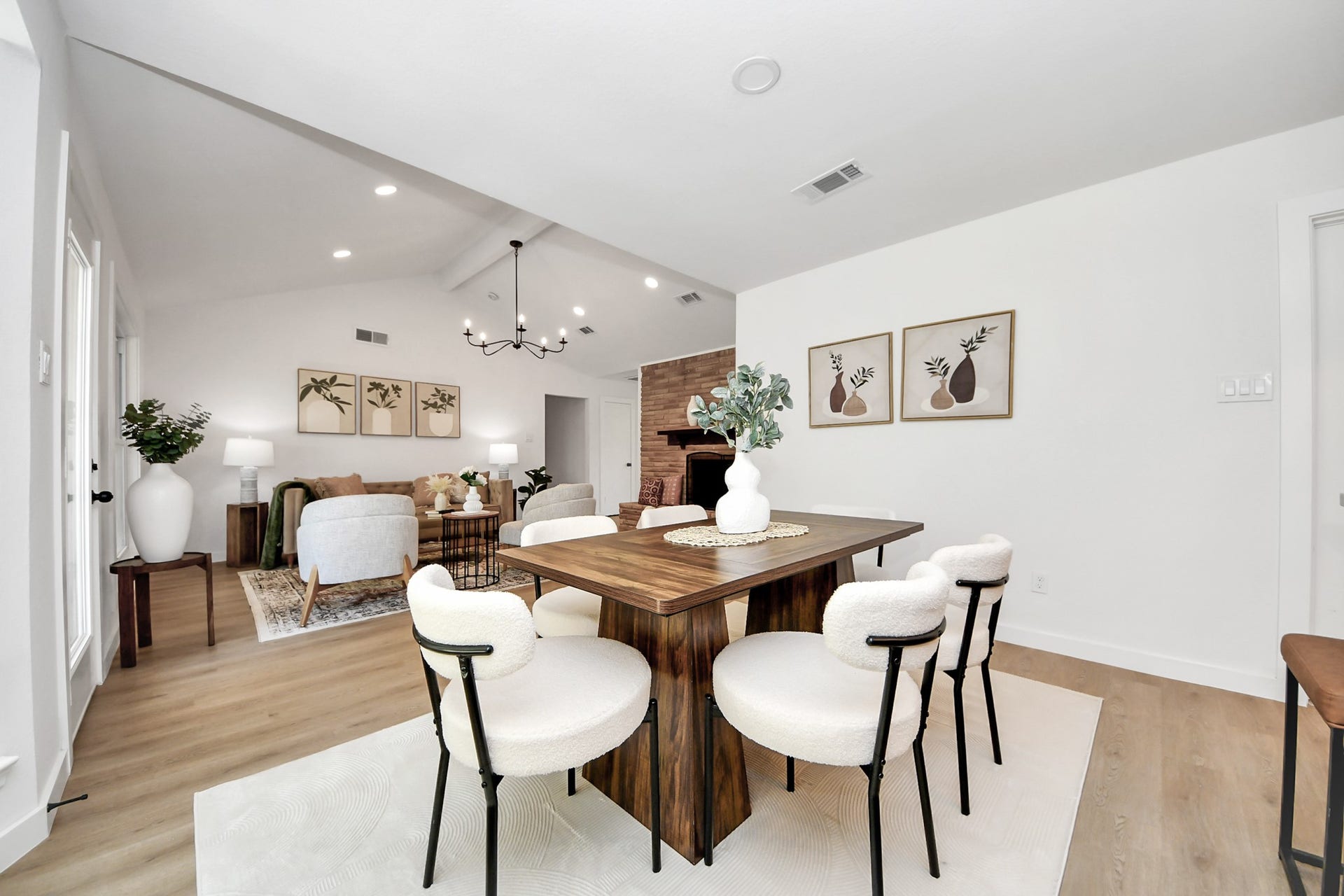 5946 Willowbend Boulevard, Houston, TX 77096 Open dining area with designer lighting, abundant natural light, and direct connection to the kitchen and living spaces.