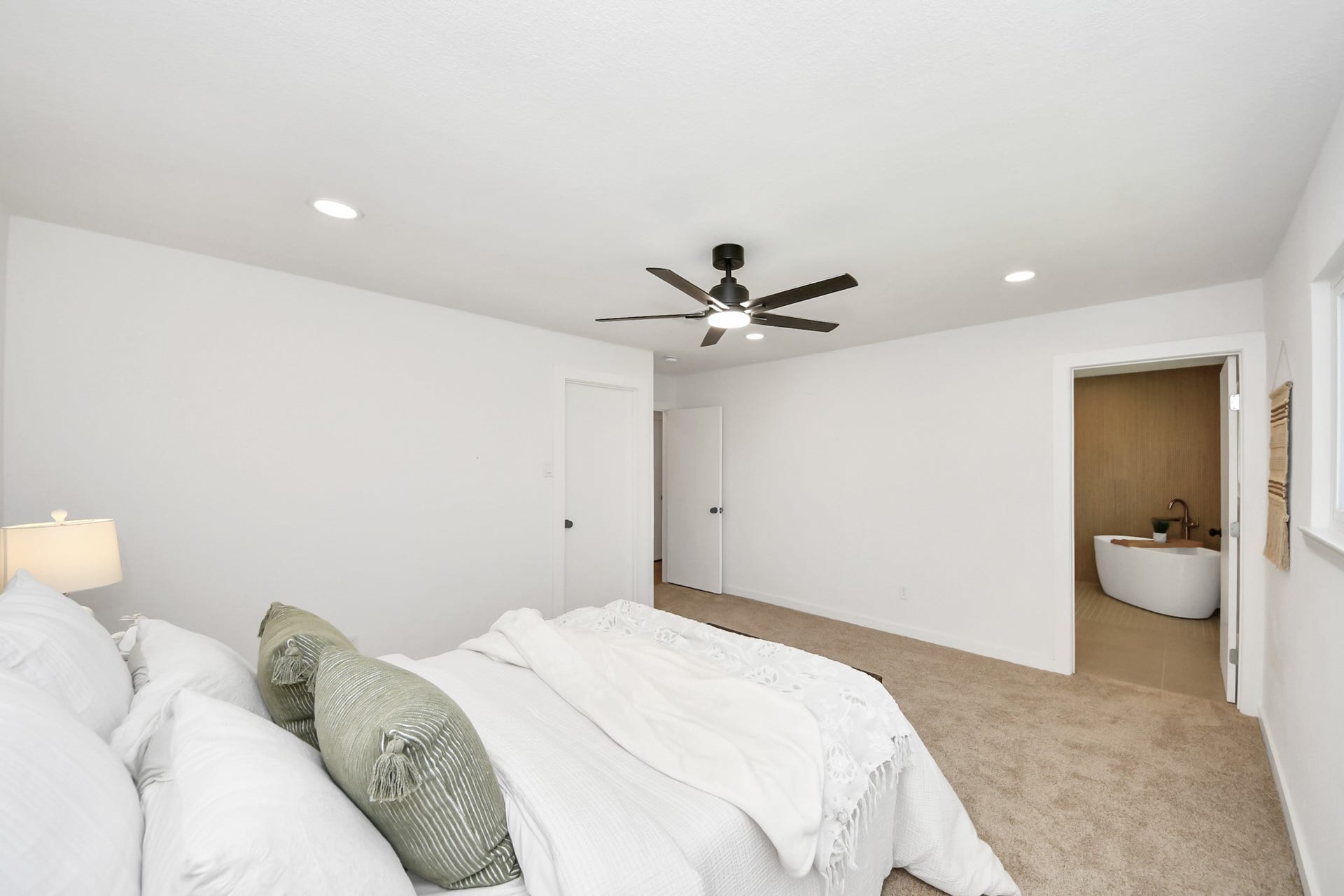 5946 Willowbend Boulevard, Houston, TX 77096 Oversized primary suite offering ample space for a sitting area, modern finishes, and a relaxing retreat feel.