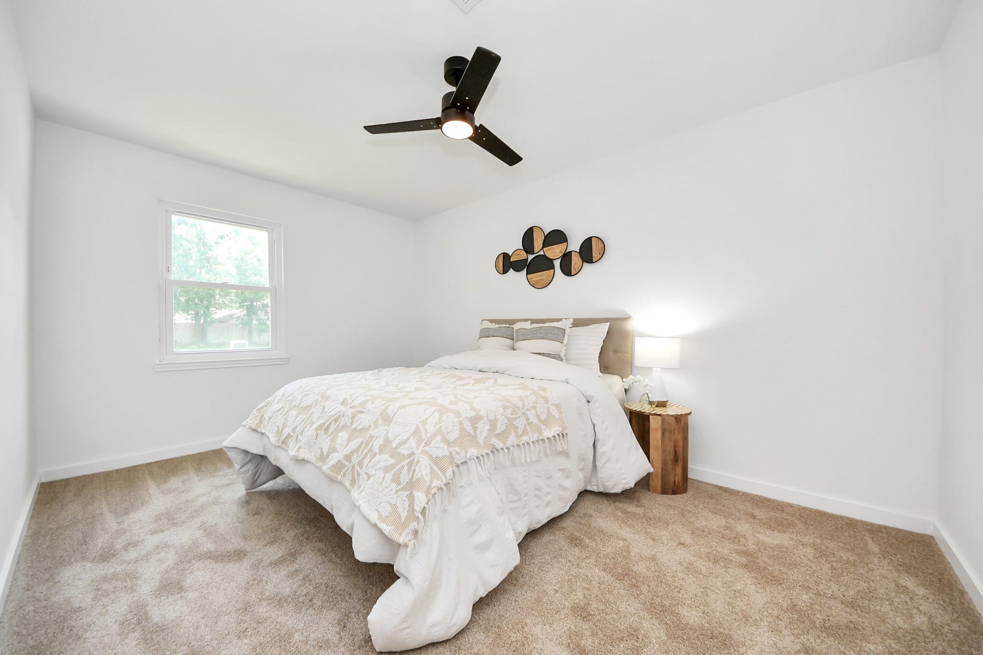 5946 Willowbend Boulevard, Houston, TX 77096 Bright and versatile secondary bedroom perfect for guests, family, or a home office setup.