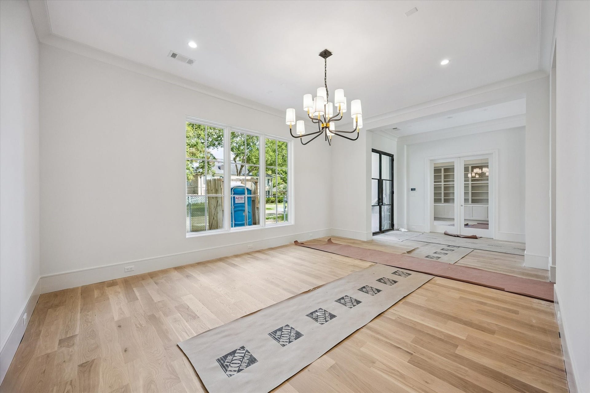 6011 Stones Throw Road, Houston, TX 77057 Another view of the elegant formal dining room, highlighted by a designer lighting fixture.