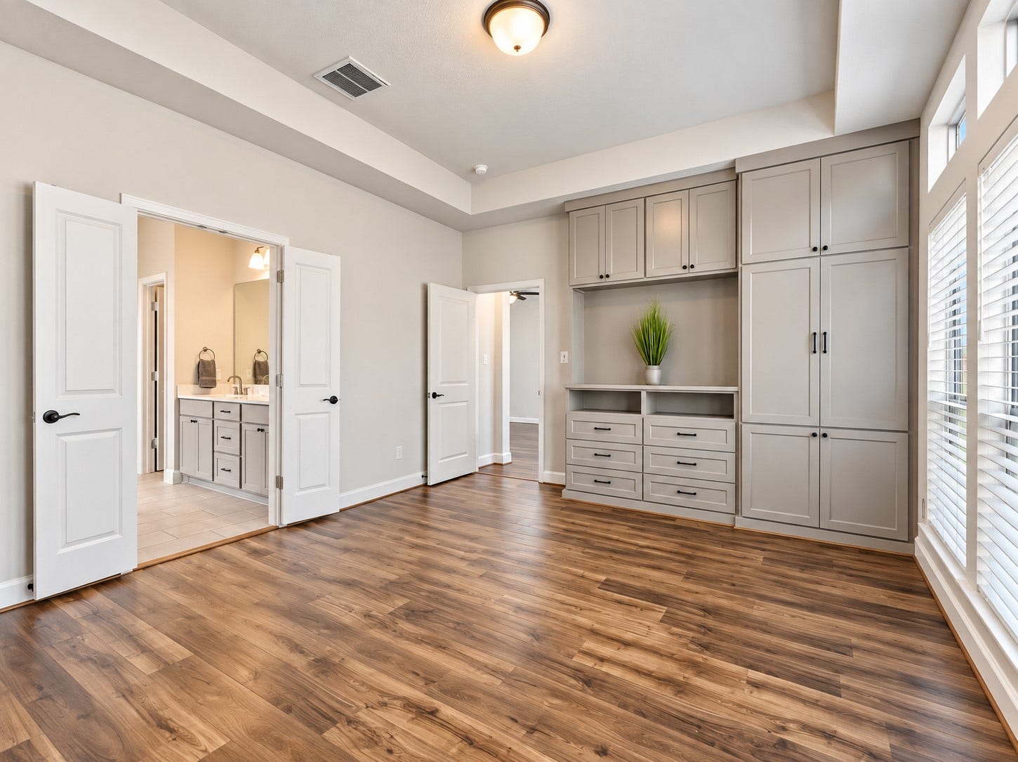 146 Dove Springs Court, Conroe, TX 77304 Luxe custom built-ins provide a practical place to keep everyday essentials organized while adding character to this relaxing space.
