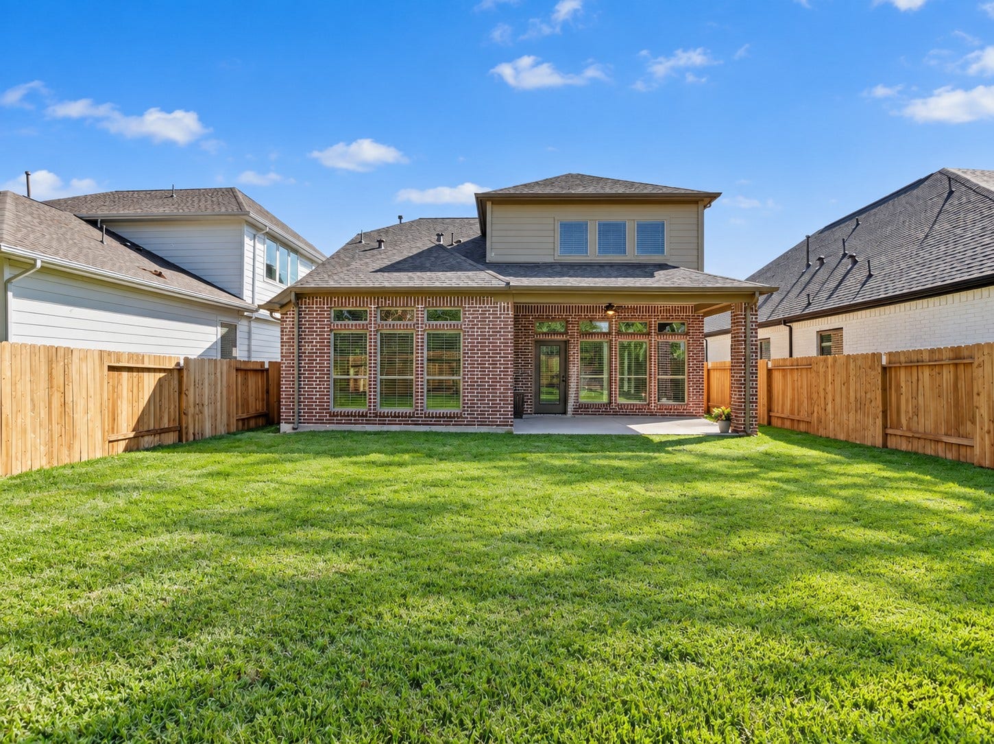 146 Dove Springs Court, Conroe, TX 77304 Step outside and enjoy a beautifully landscaped backyard with peaceful green-space views and no back neighbors, giving you a little extra privacy at home.
