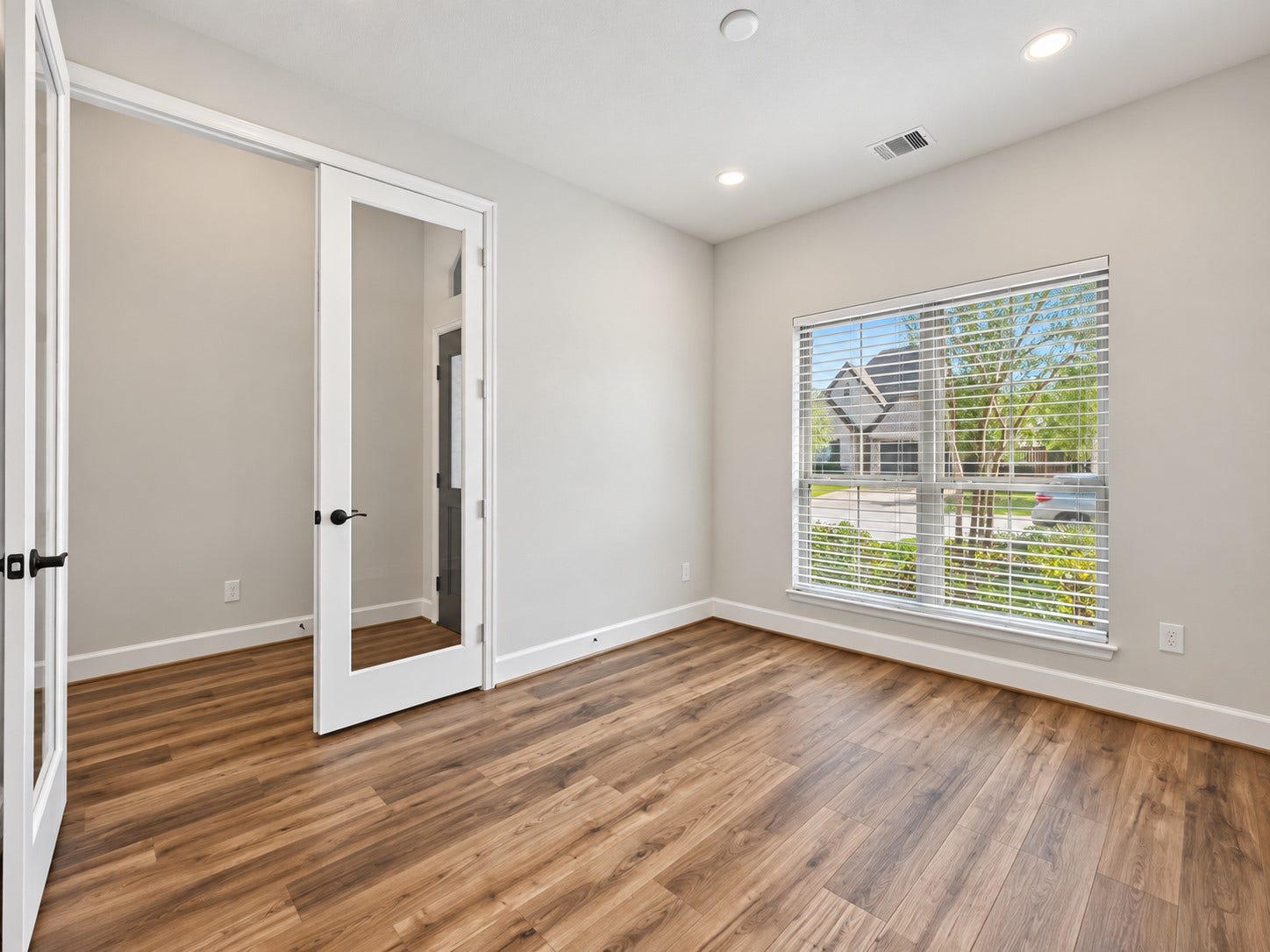 146 Dove Springs Court, Conroe, TX 77304 The front-facing study offers a pleasant view of the landscaped yard while giving you a dedicated space to focus or get things done.