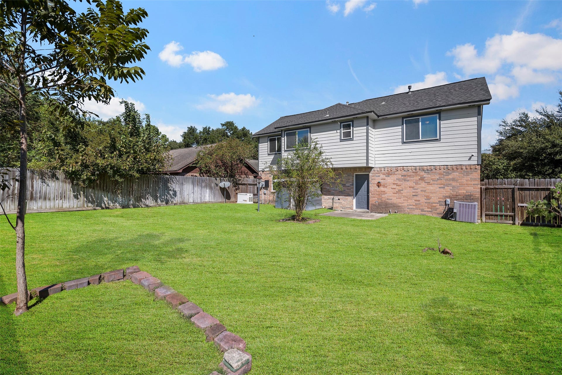 19331 Diversion Drive, Tomball, TX 77375 Plenty of Backyard space with Garage access