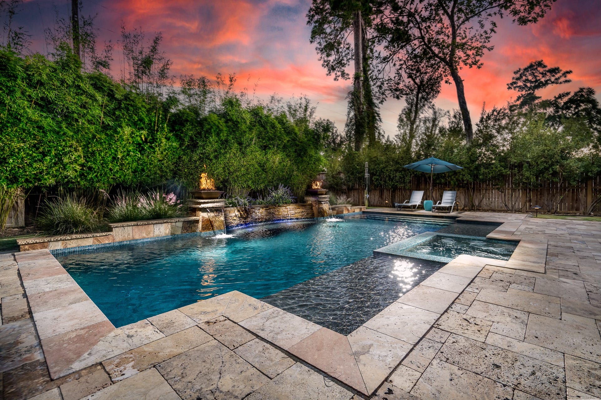 13807 Oak Fair Bend, Cypress, TX 77429 WHEN THE SUN GOES DOWN, THE MAGIC BEGINS! ??? Imagine ending every day in your own private resort-style paradise! Cascading waterfalls, mesmerizing fire features, a sparkling pool and inviting spa create an unforgettable outdoor escape. Surrounded by lush tropical-inspired landscaping and breathtaking skies, this extraordinary backyard oasis is where luxury living meets everyday vacation vibes! ????