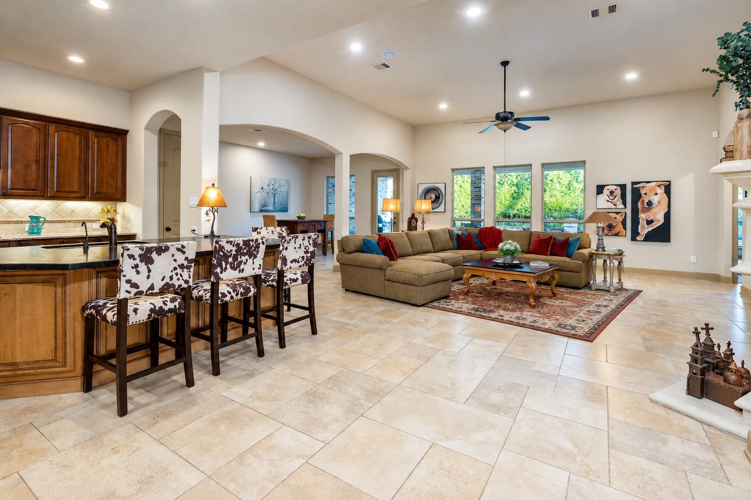 13807 Oak Fair Bend, Cypress, TX 77429 Where everyday moments become cherished memories! This spacious, light-filled breakfast room offers the perfect setting for morning coffee, casual family meals, and lively conversations. Seamlessly connected to the expansive family room and kitchen, its open design creates an inviting atmosphere for effortless entertaining, while beautiful views of the private backyard pool oasis bring a touch of resort-inspired living to every day.