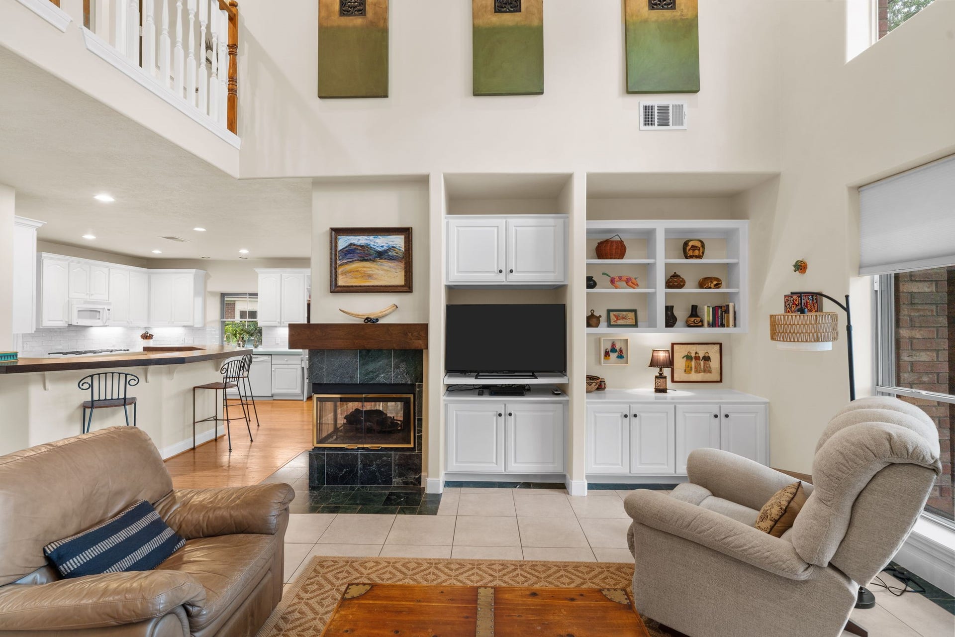 39 Rippling Creek Drive, Sugar Land, TX 77479 A wall of built-ins provides storage, helping to keep the space organized and clutter-free.