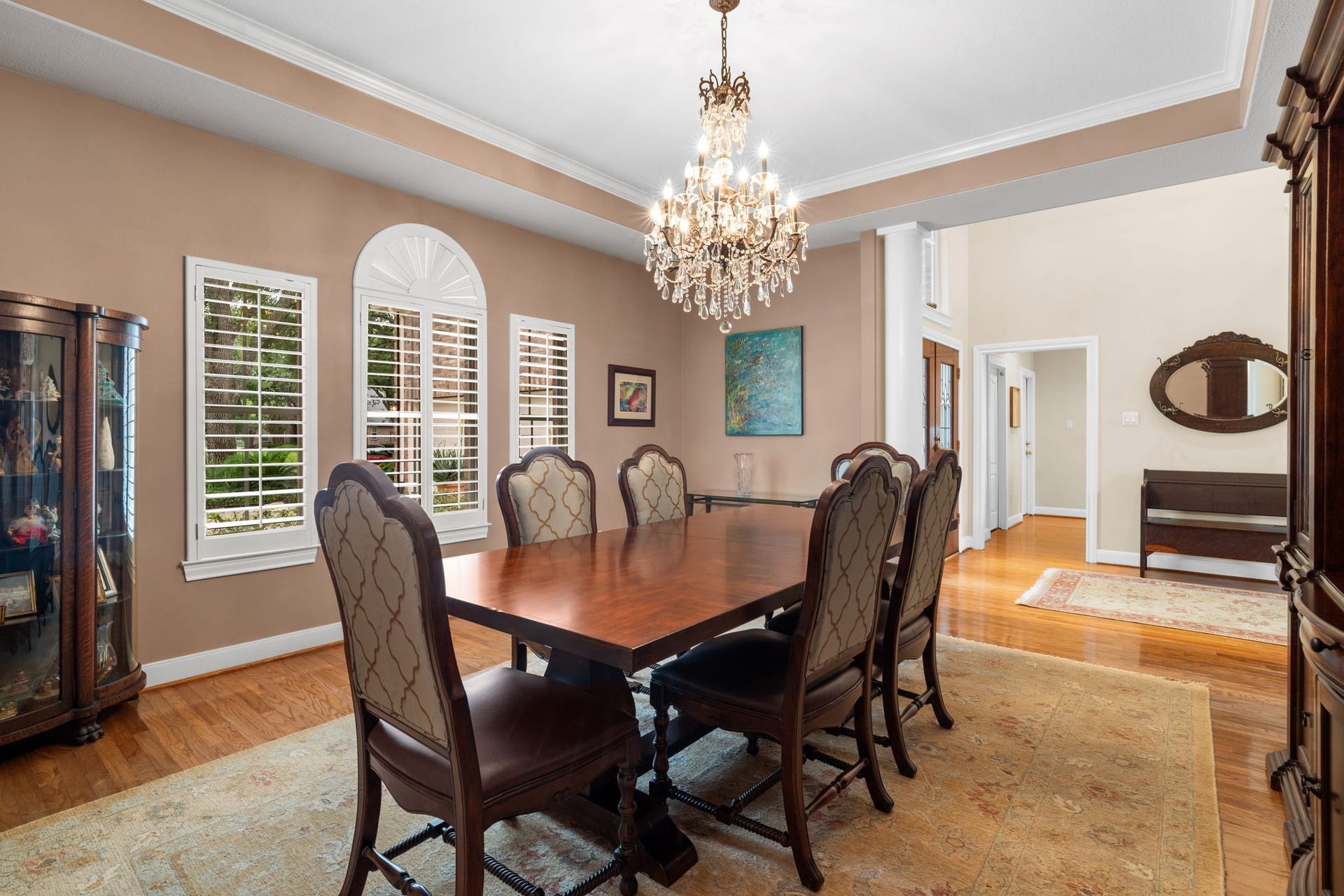 39 Rippling Creek Drive, Sugar Land, TX 77479 The dining room is beautifully appointed with a stunning crystal chandelier and recessed ceiling.