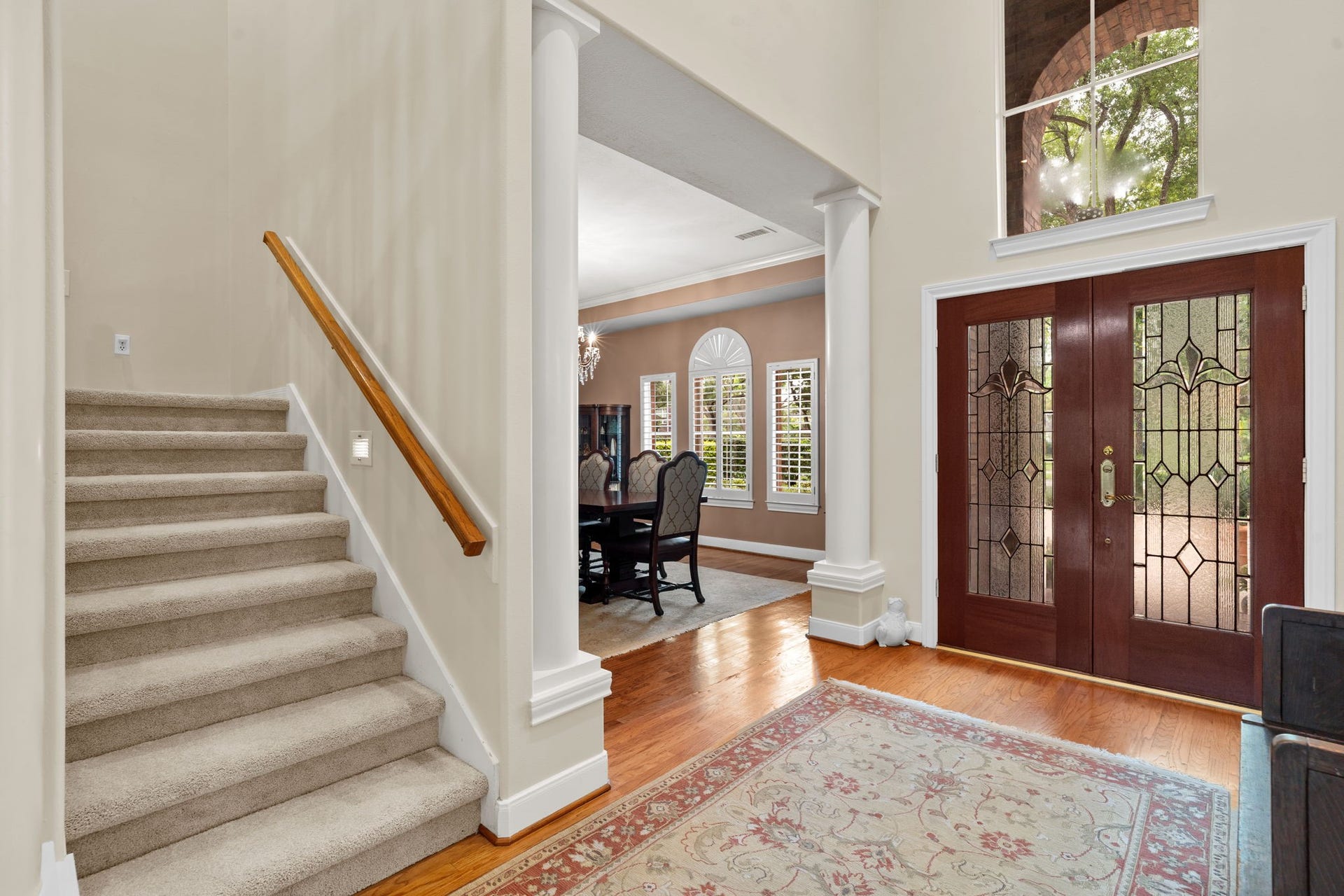 39 Rippling Creek Drive, Sugar Land, TX 77479 Columns flanking the dining room entrance create a graceful architectural frame, adding a sense of formality and distinction to the space.