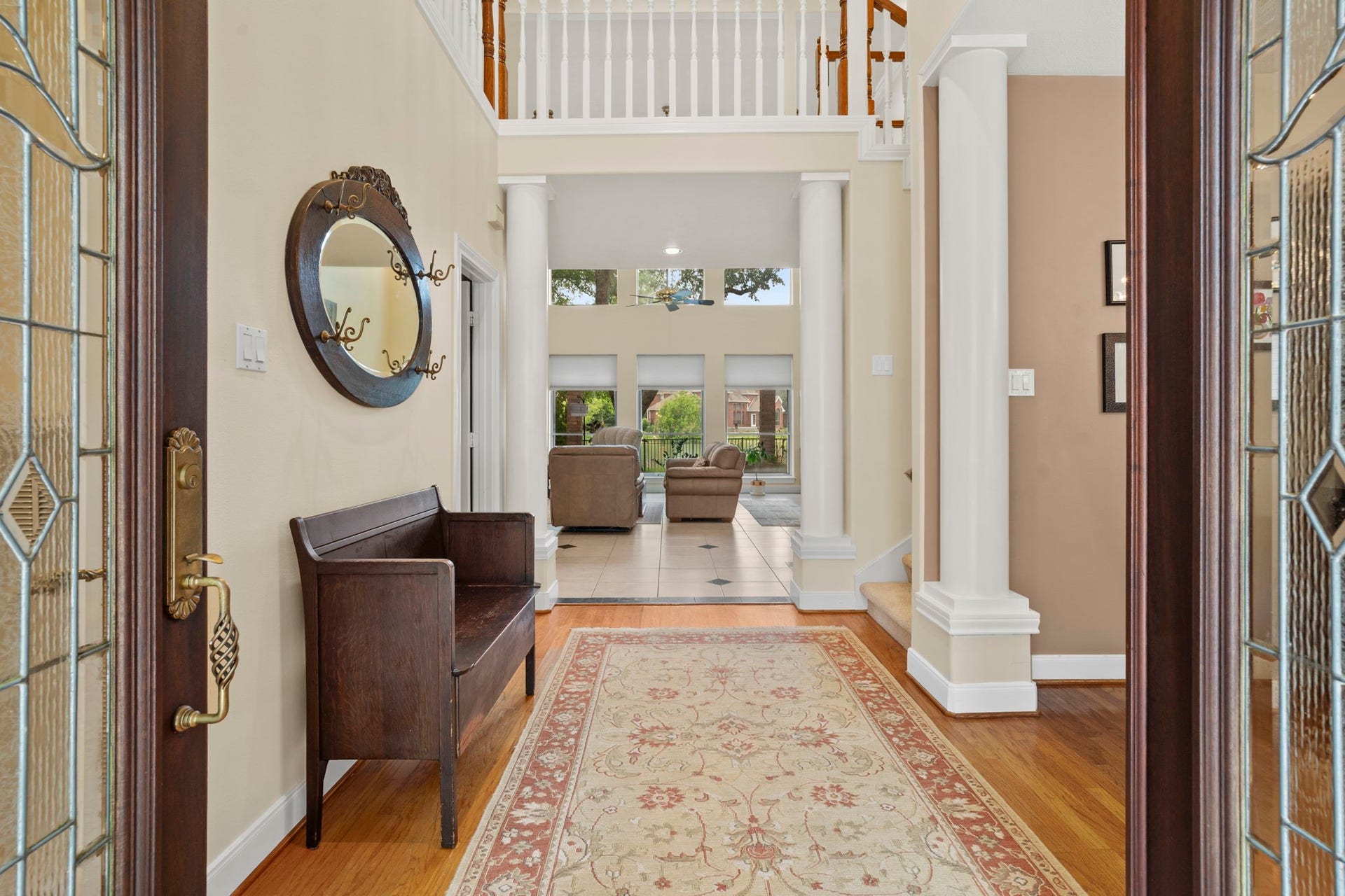 39 Rippling Creek Drive, Sugar Land, TX 77479 As you enter, a formal foyer with soaring two-story ceilings sets the tone for the homes refined design and spacious feel.