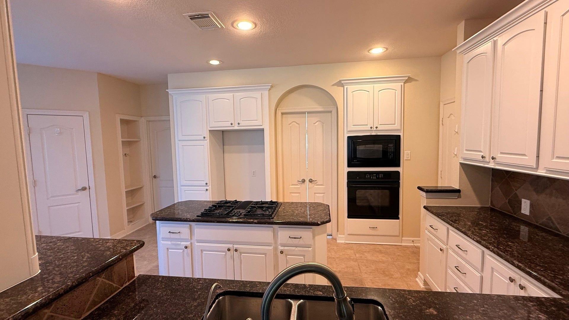 21603 Statfield Glen, Katy, TX 77450 Featuring elegant granite countertops and a sleek undermount dual sink.