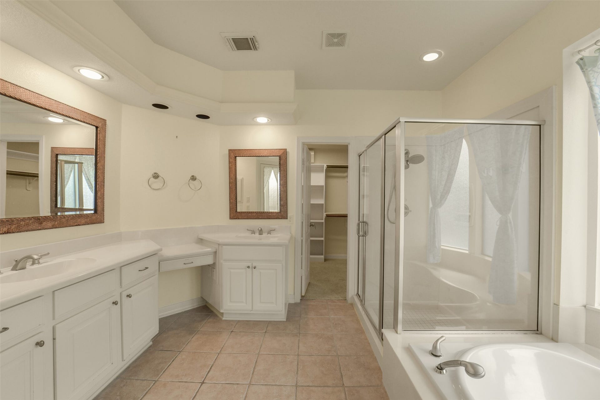 21603 Statfield Glen, Katy, TX 77450 The ensuite has a his and hers vanity and a makeup desk.
