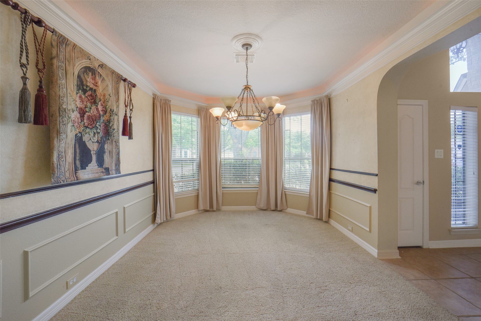 21603 Statfield Glen, Katy, TX 77450 A view of the formal dining room, complete with window treatments, blinds, and an entry foyer.