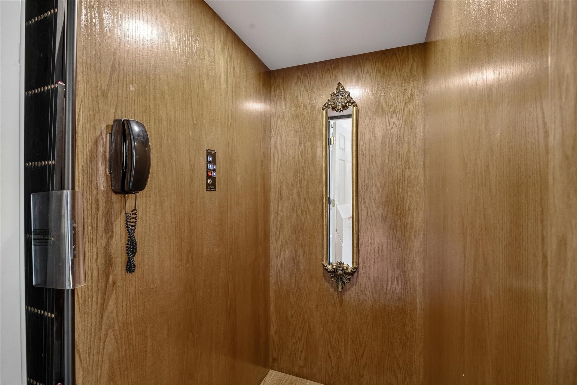 An operational elevator serving both floors adds convenience and accessibility within the home.