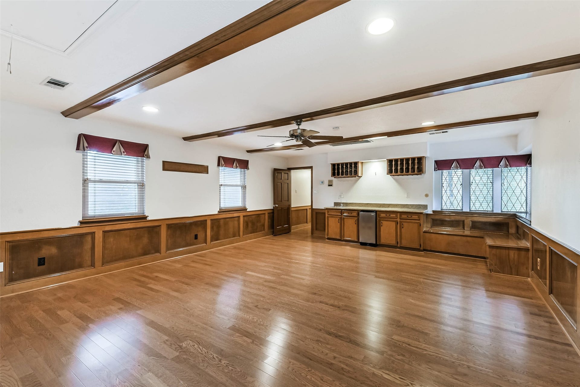 Large game room/ media room above garage, accessed from second staircase in kitchen and living room.