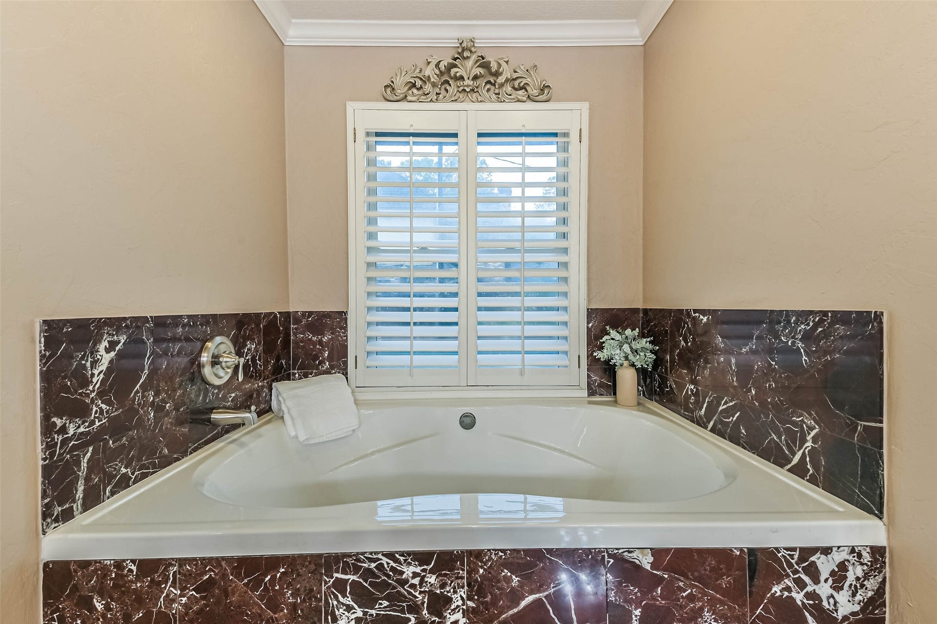 Oversize separate tub in primary bath.