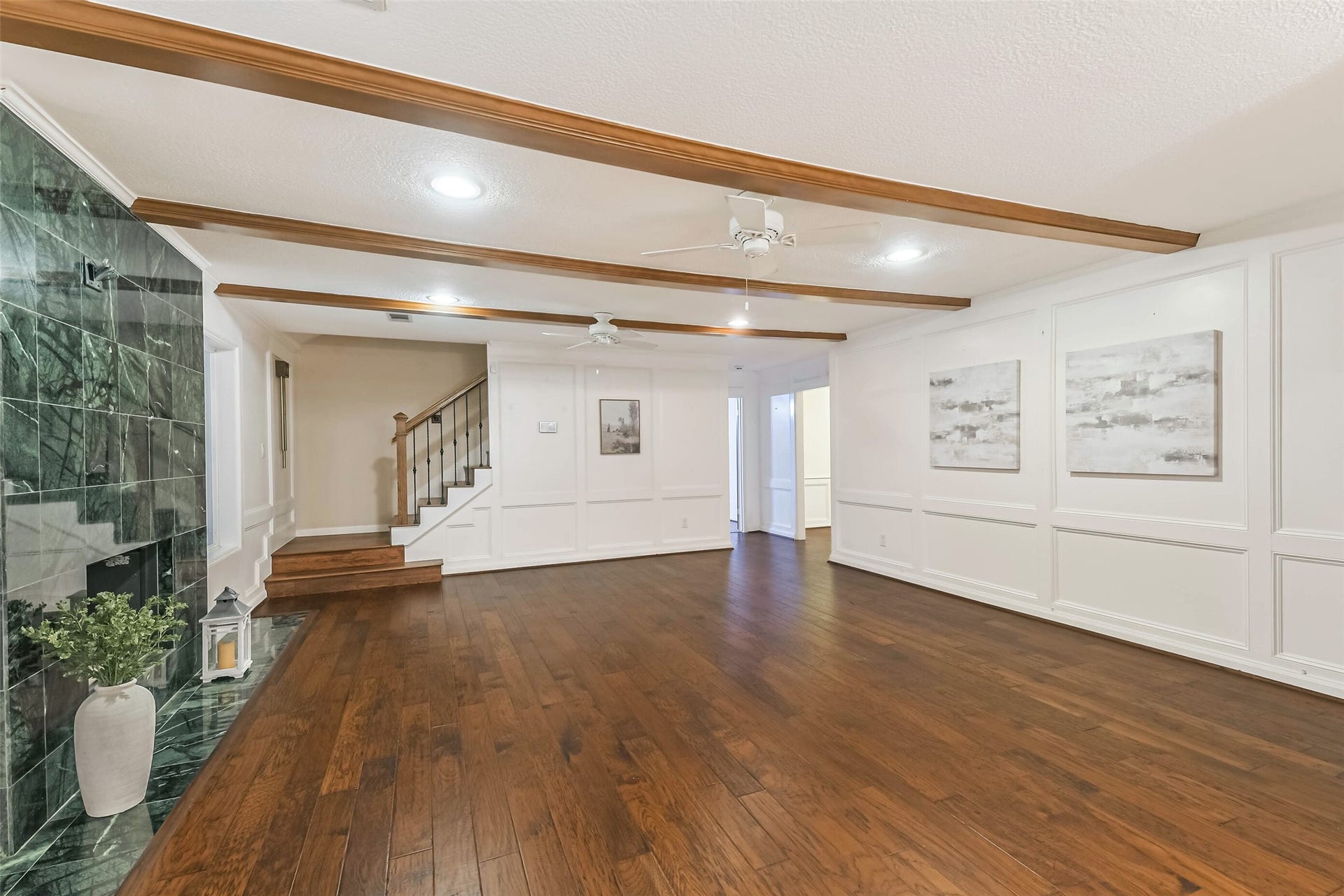 Wood floors and custom paneling.